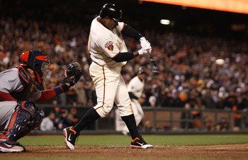 SAN FRANCISCO, CA - APRIL 09:  Miguel Tejada #10 of the San Francisco Giants collects the game winning hit in the ninth inning against the St. Louis Cardinals at AT&T Park on April 9, 2011 in San Francisco, California.  (Photo by Jed Jacobsohn/Getty Image