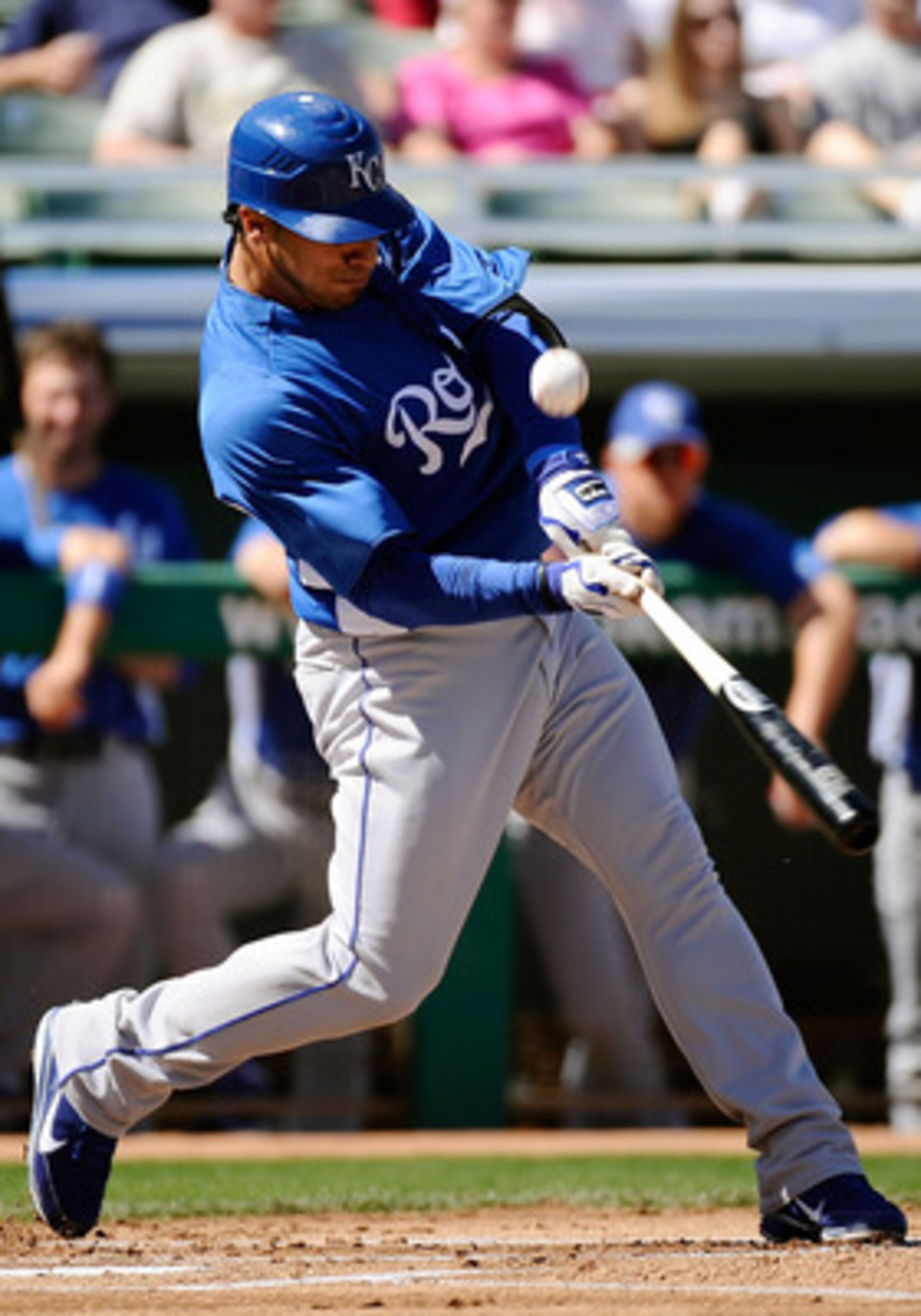 MESA, AZ - MARCH 09:  Mike Aviles #13 of the Kansas City Royals at bat against the Chicago Cubs during the spring training baseball game at HoHoKam Stadium on March 9, 2011 in Mesa, Arizona.  (Photo by Kevork Djansezian/Getty Images)