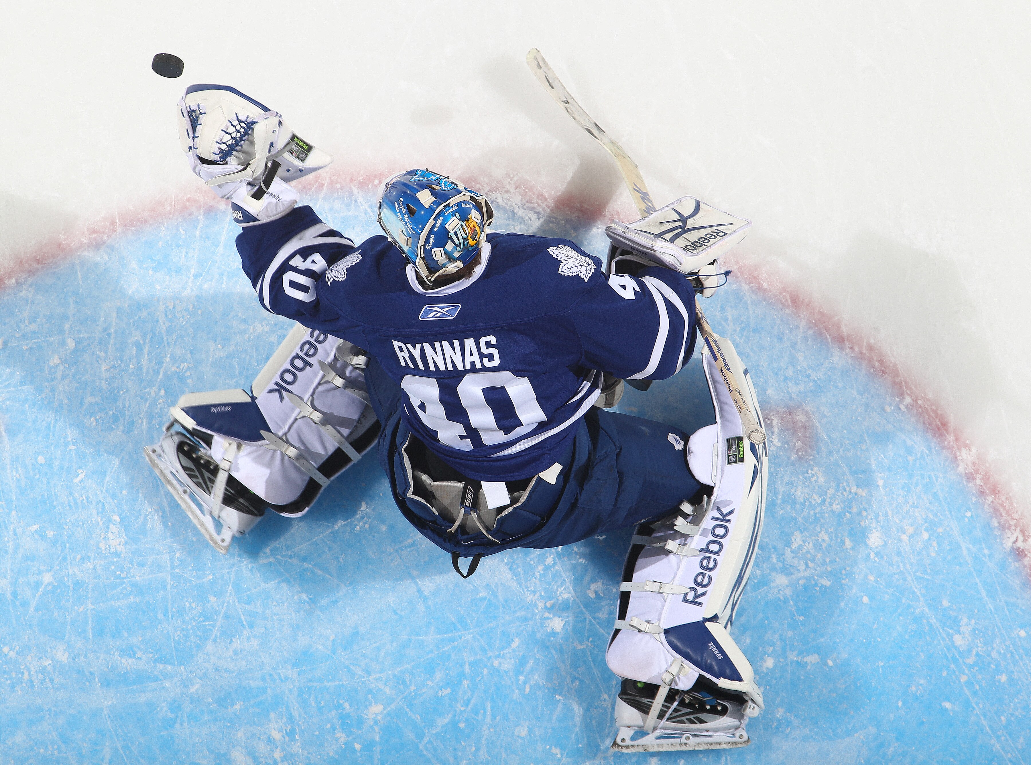 LONDON, CANADA - SEPTEMBER 14:  Jussi Rynnas #40 of the Toronto Maple Leafs stops a shot in warm-up prior to a game against the Ottawa Senators during the NHL Rookie Tournament on September 14,2010 at the John Labatt Centre in London, Ontario, Canada. The