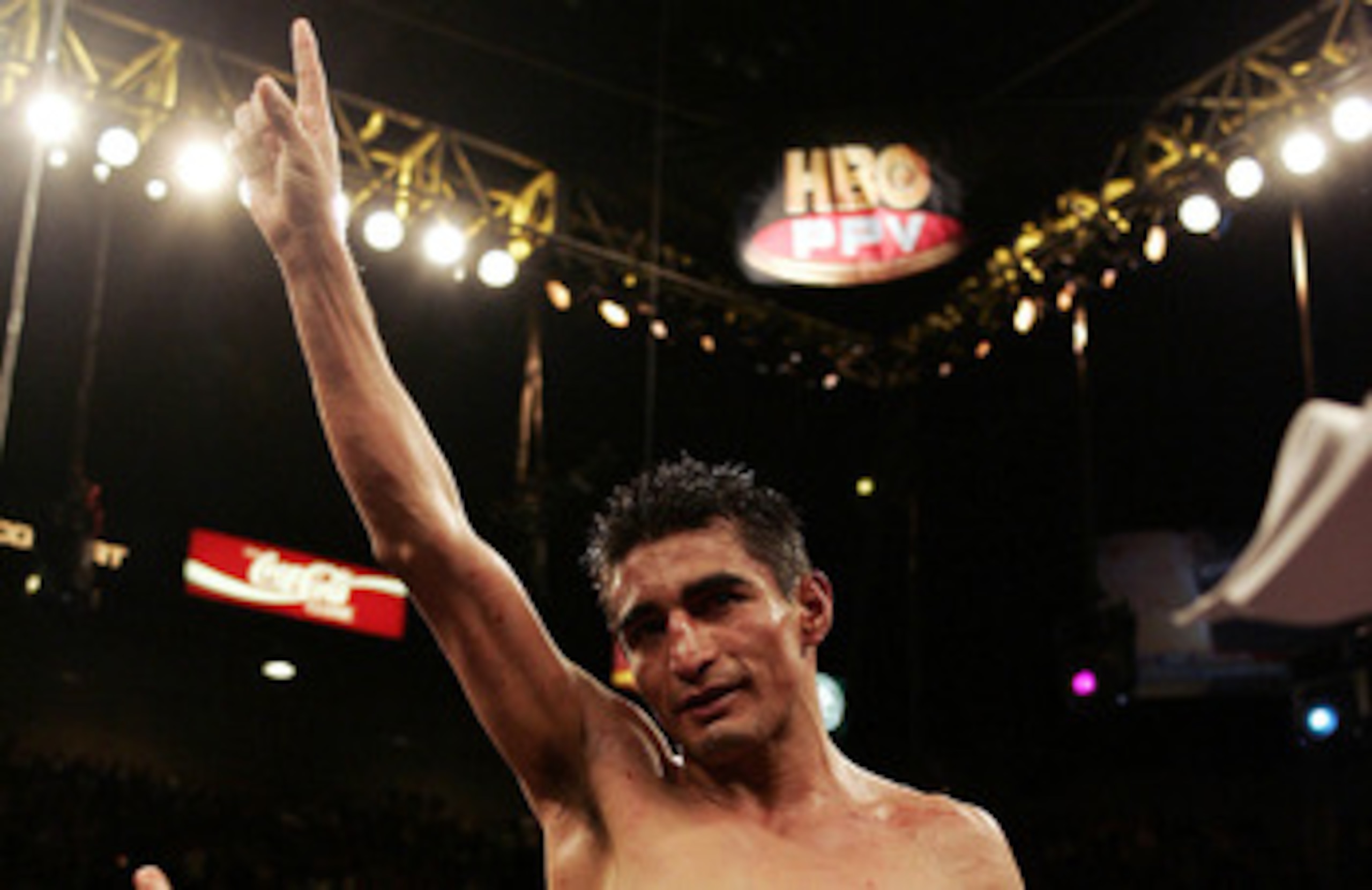 LAS VEGAS - MARCH 19:  Eric Morales of Mexico celebrates his 15-13 unanimous decision victory over Manny Pacquiao of Philippines during the World Super Featherweight Championship at the MGM Grand Hotel on March 19, 2005 in Las Vegas, Nevada.  (Photo by Do