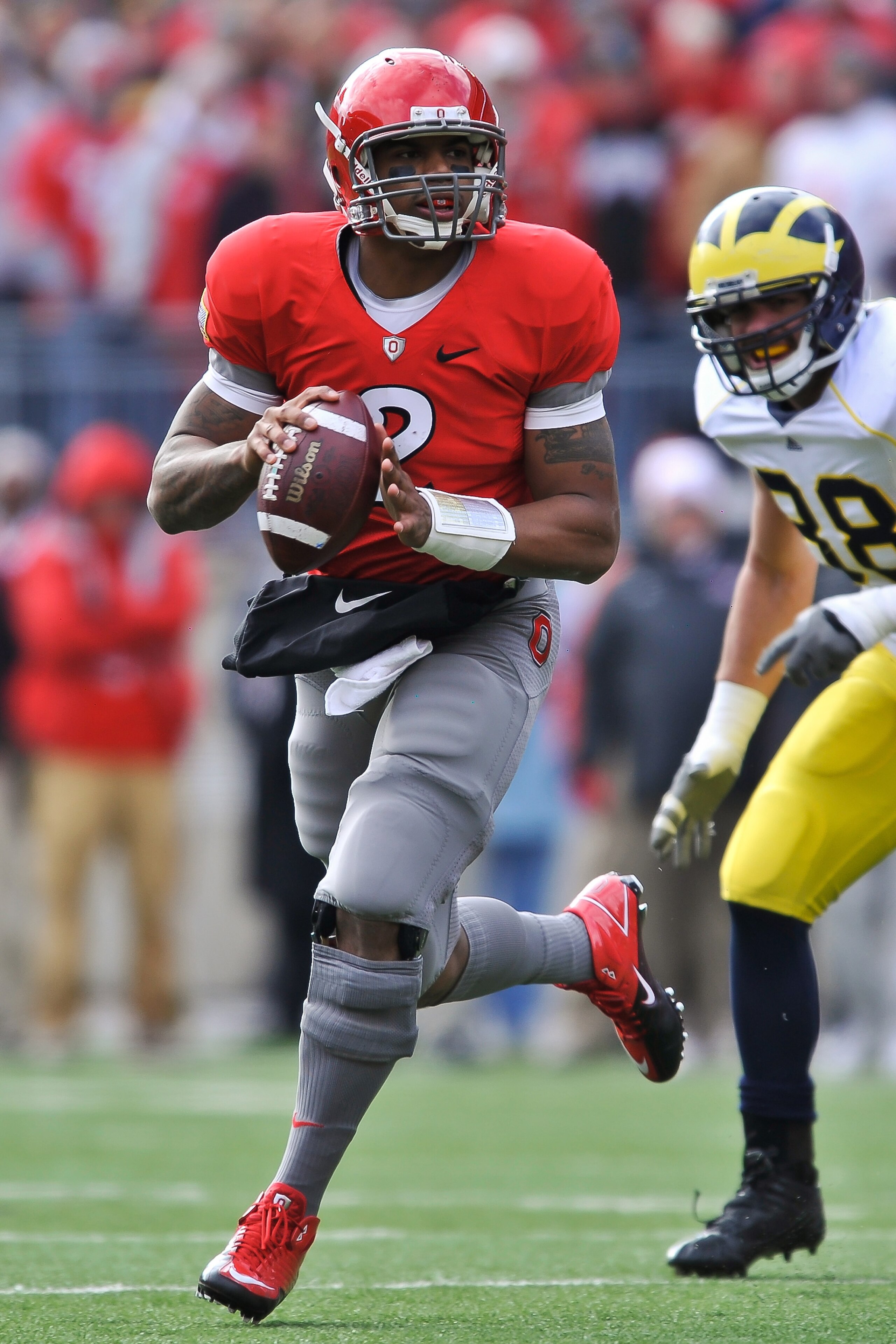 COLUMBUS, OH - NOVEMBER 27: Quarterback Terrelle Pryor #2 of the Ohio State Buckeyes rolls out of the pocket against the Michigan Wolverines at Ohio Stadium on November 27, 2010 in Columbus, Ohio. (Photo by Jamie Sabau/Getty Images) COLUMBUS, OH - NOVEMBER 27: Quarterback Terrelle Pryor #2 of the Ohio State Buckeyes rolls out of the pocket against the Michigan Wolverines at Ohio Stadium on November 27, 2010 in Columbus, Ohio. (Photo by Jamie Sabau/Getty Images)