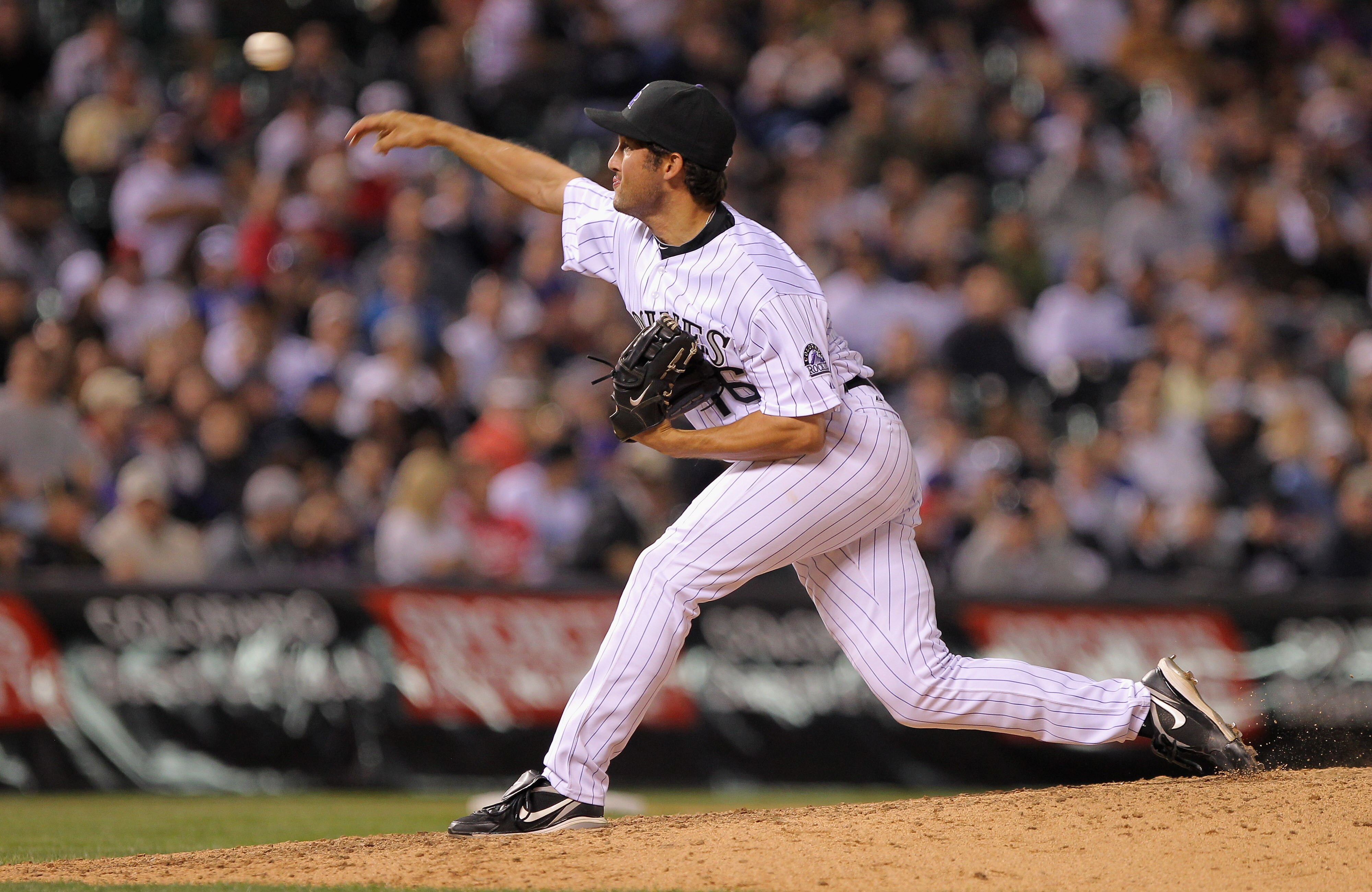 DENVER, CO - APRIL 05:  Closer Huston Street #16 of the Colorado Rockies works against the Los Angeles Dodgers in the ninth inning at Coors Field on April 5, 2011 in Denver, Colorado. Street earned a save as the Rockies defeated the Dodgers 3-0.  (Photo b