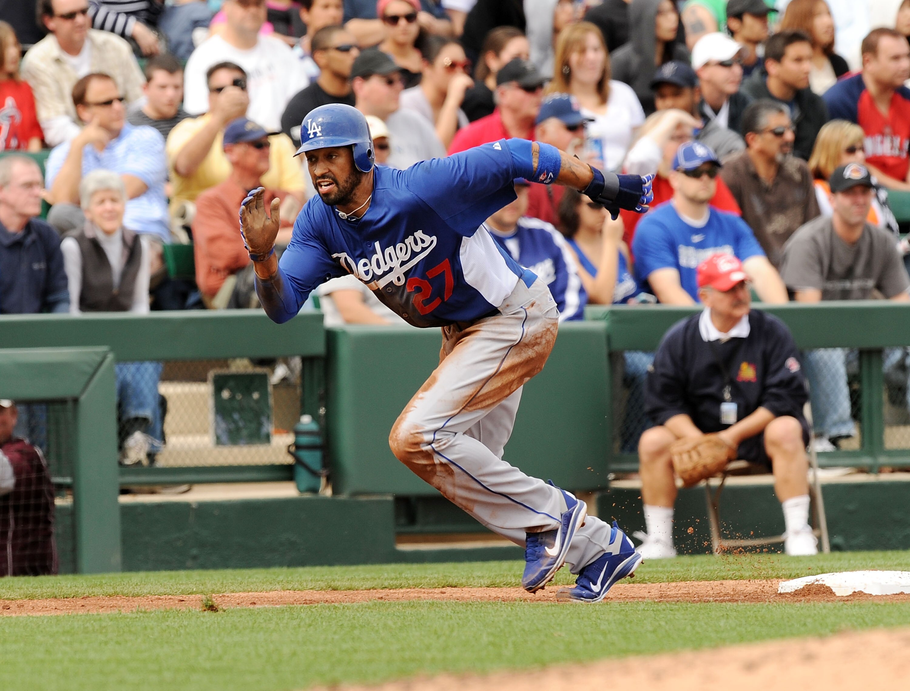 TEMPE, AZ - FEBRUARY 26:  Matt Kemp #27 of the Los Angeles Dodgers runs from third base to home plate against the Los Angeles Angels of Anaheim at Tempe Diablo Stadium on February 26, 2011 in Tempe, Arizona.  (Photo by Norm Hall/Getty Images)