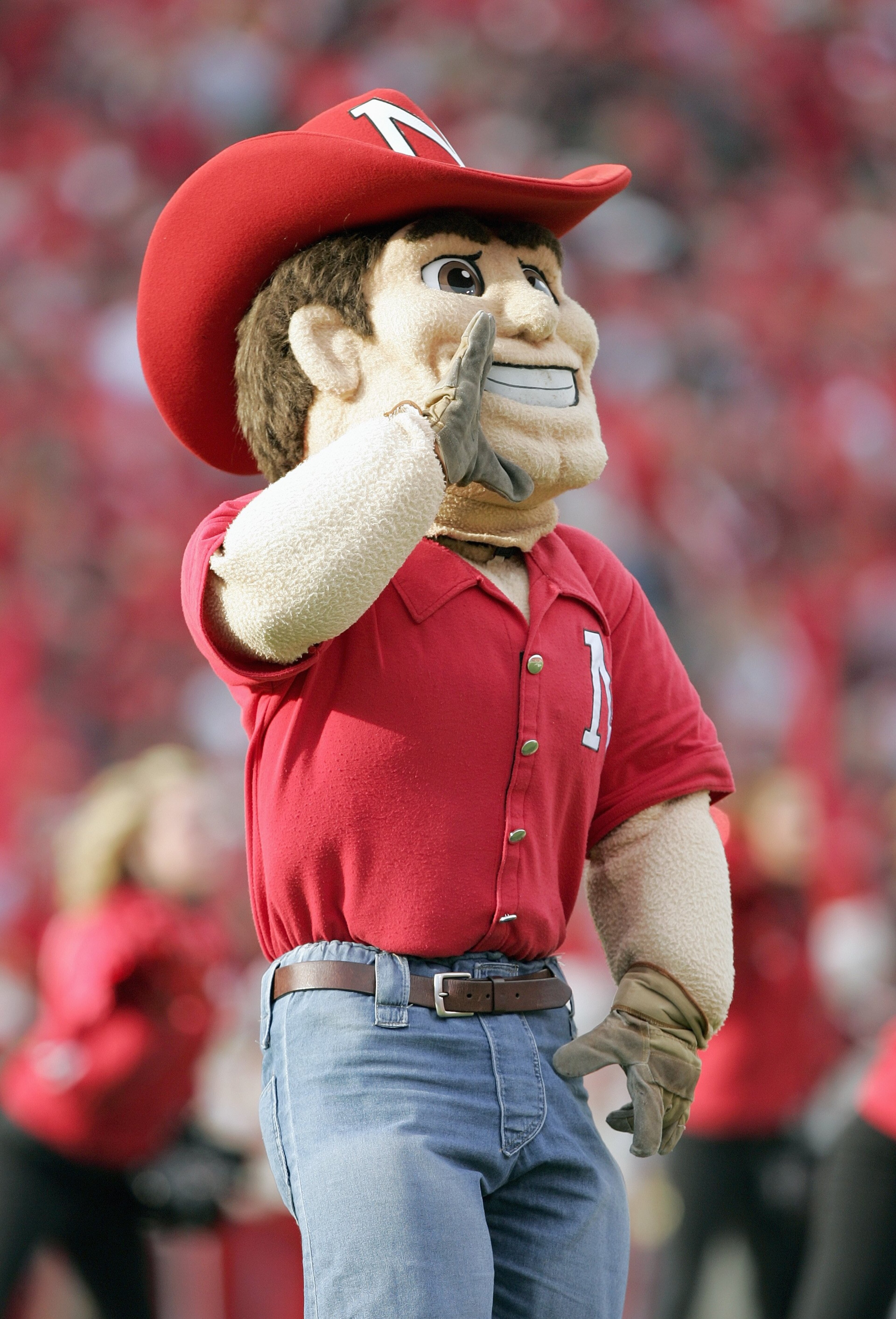 LINCOLN, NE - NOVEMBER 24: Mascot Herbie Husker of the Nebraska Cornhuskers yells during the game against the Colorado Buffaloes on November 24, 2006 at Memorial Stadium in Lincoln, Nebraska. Nebraska won 37-14. (Photo by Brian Bahr/Getty Images) LINCOLN, NE - NOVEMBER 24: Mascot Herbie Husker of the Nebraska Cornhuskers yells during the game against the Colorado Buffaloes on November 24, 2006 at Memorial Stadium in Lincoln, Nebraska. Nebraska won 37-14. (Photo by Brian Bahr/Getty Images)