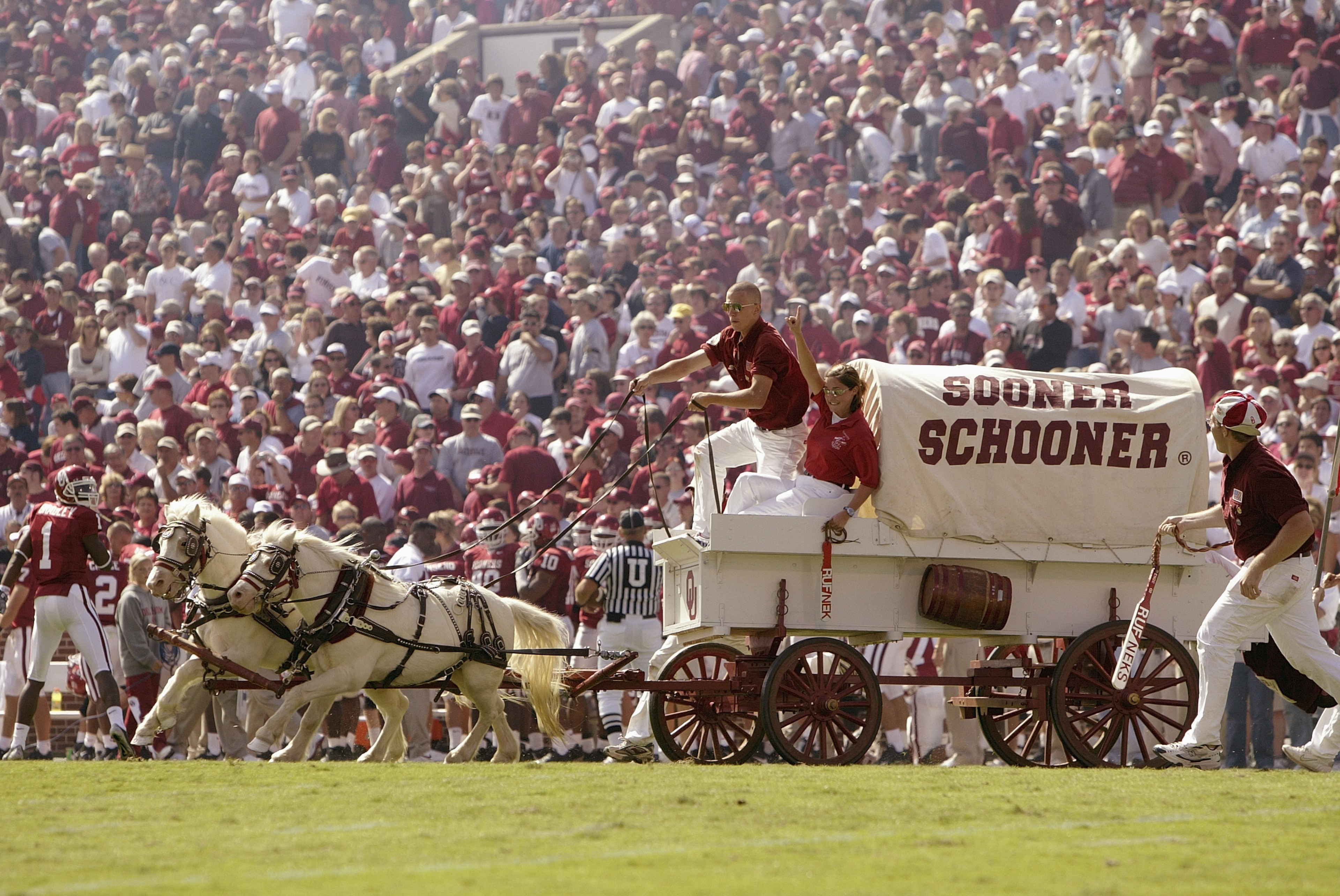 NORMAN, OK - OCTOBER 2: The Oklahoma Sooner Schooner travels across the field before the football game against Texas Tech Red Raiders on October 2, 2004 at Memorial Stadium in Norman, Oklahoma. The Sooners defeated the Red Raiders 28-13. (Photo by Bri NORMAN, OK - OCTOBER 2: The Oklahoma Sooner Schooner travels across the field before the football game against Texas Tech Red Raiders on October 2, 2004 at Memorial Stadium in Norman, Oklahoma. The Sooners defeated the Red Raiders 28-13. (Photo by Bri