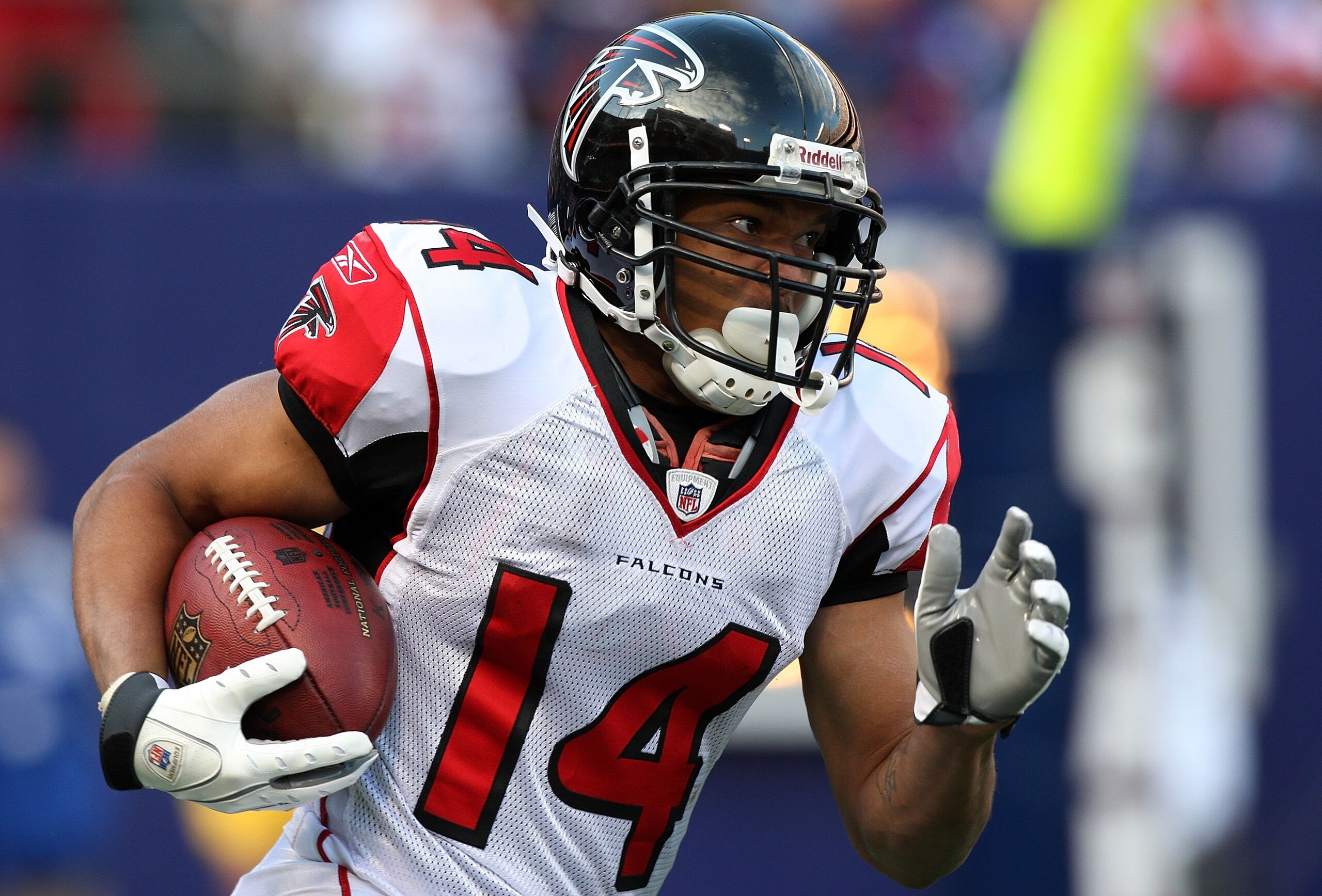 EAST RUTHERFORD, NJ - NOVEMBER 22:  Eric Weems #14 of the Atlanta Falcons runs the ball after a kick off against the New York Giants on November 22, 2009 at Giants Stadium in East Rutherford, New Jersey. The Giants defeated the Falcons 34-31 in overtime.