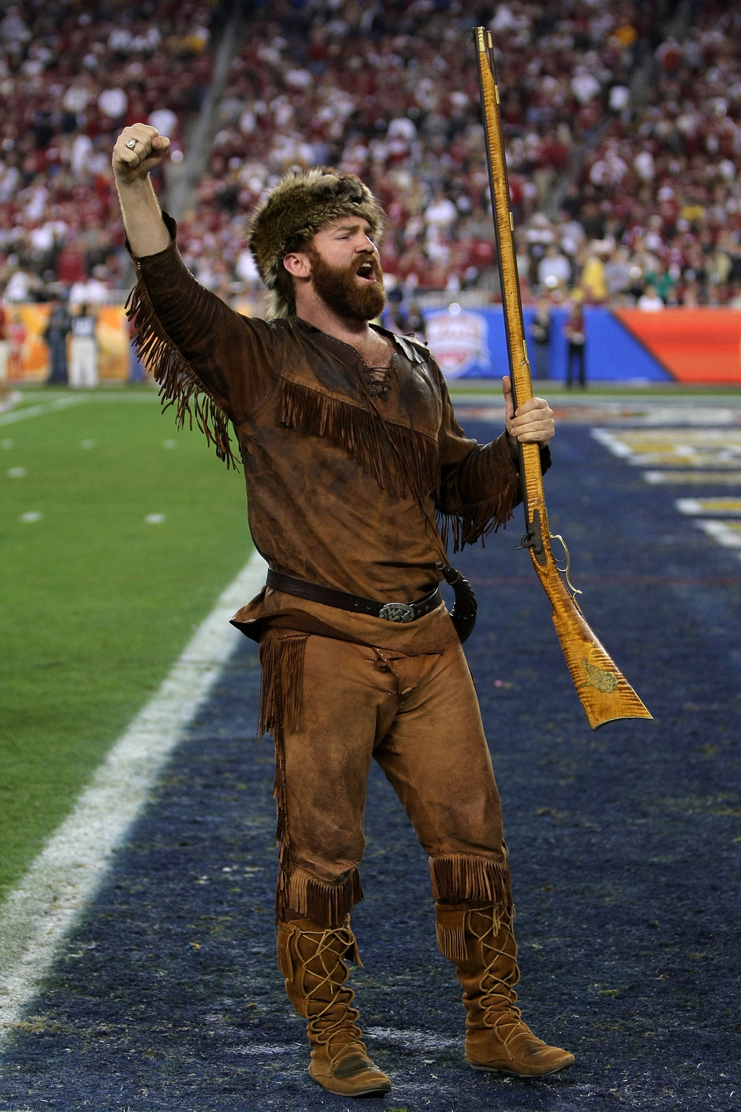 GLENDALE, AZ - JANUARY 02:  The mascot of the West Virginia Mountaineers fires up the crowd before the Mountaineers take on the Oklahoma Sooners at the Tostito's Fiesta Bowl at University of Phoenix Stadium January 2, 2008 in Glendale, Arizona.  (Photo by