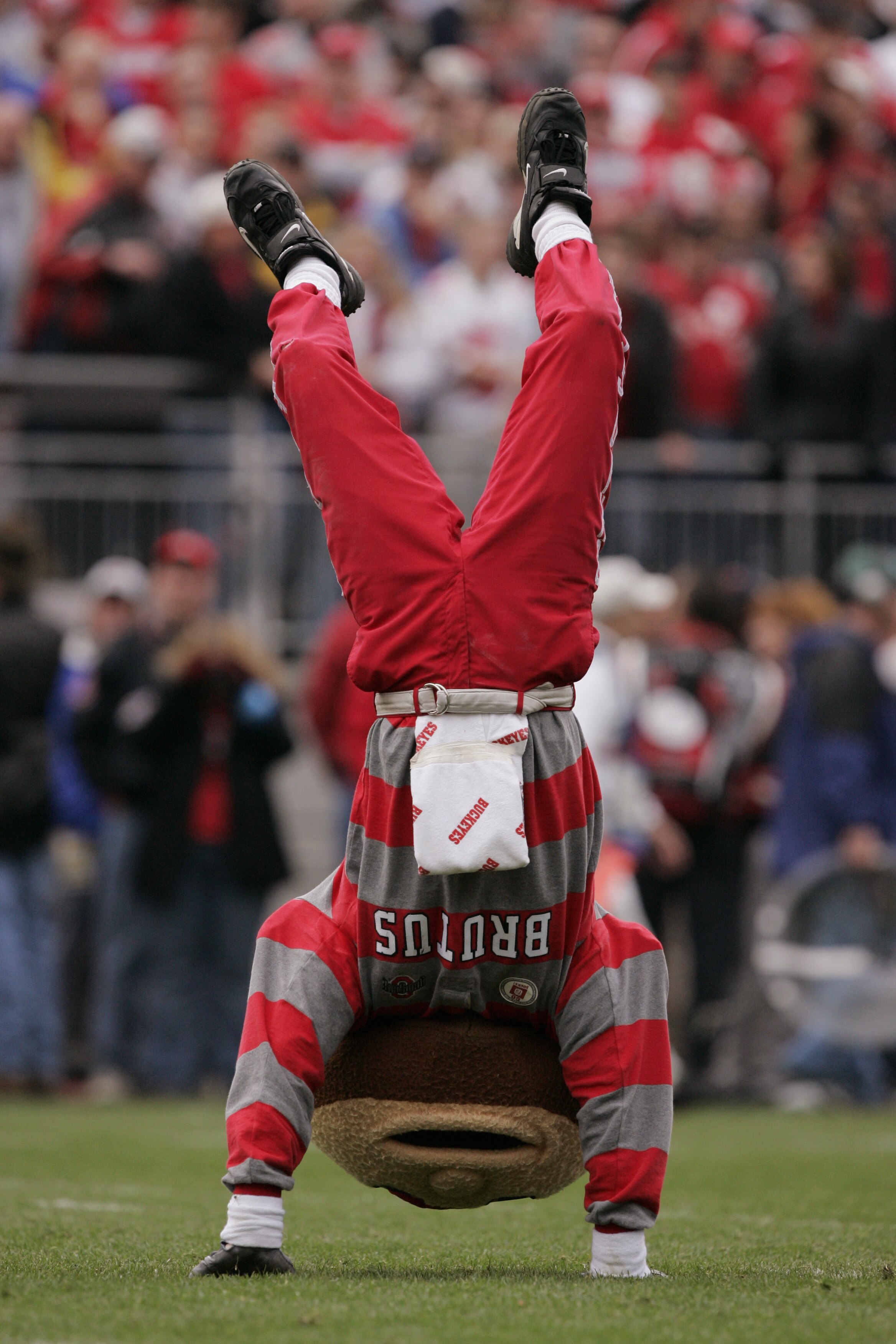 COLUMBUS, OH - NOVEMBER 20:  Brutus Buckeye, the mascot of the Ohio State University Buckeyes, performs during the game against the University of Michigan Wolverines on November 20, 2004 at Ohio Stadium in Columbus, Ohio.  Ohio State defeated Michigan 37-