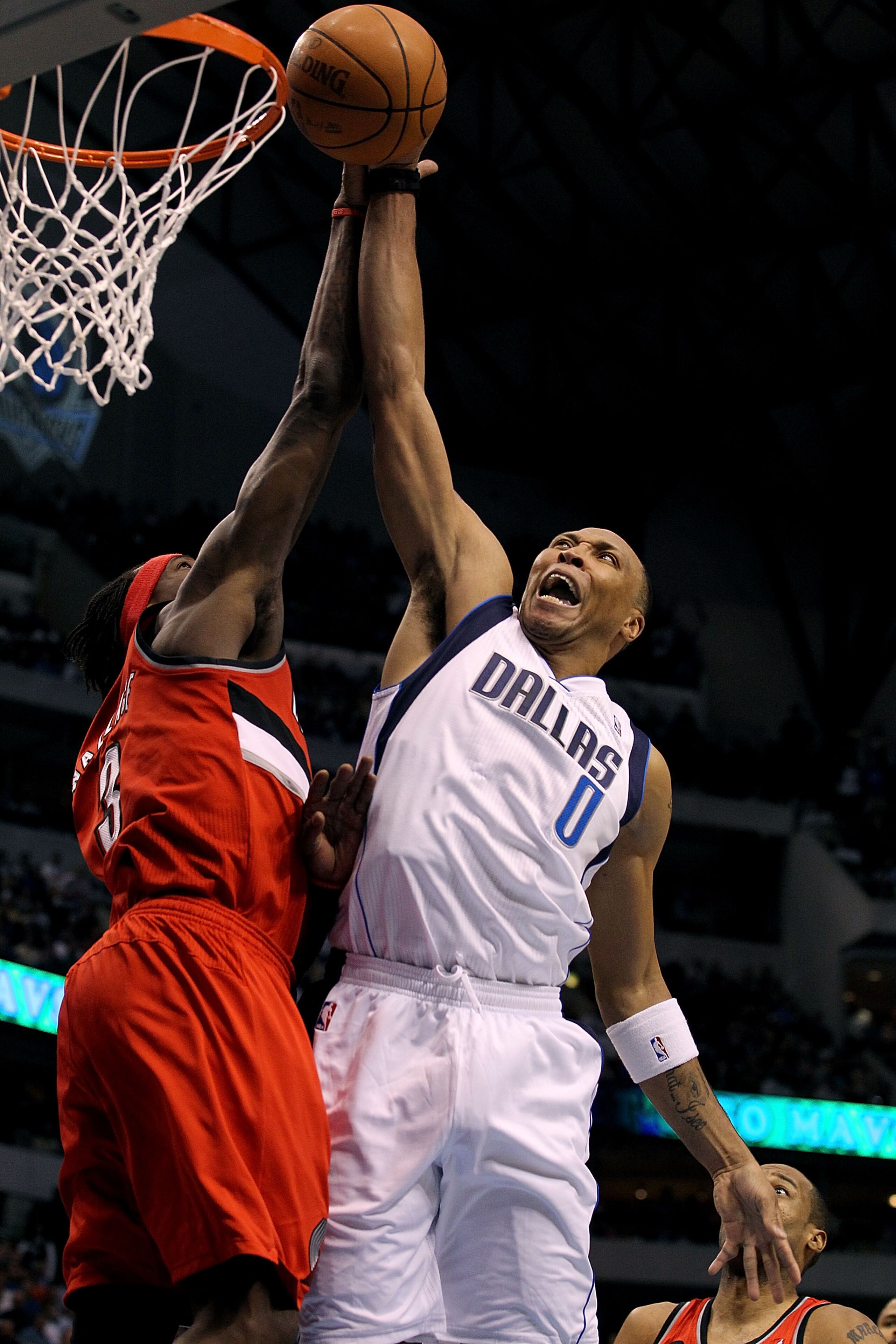 DALLAS, TX - APRIL 16: Forward Shawn Marion #0 of the Dallas Mavericks is fouled by Gerald Wallace #3 of the Portland Trail Blazers in Game One of the Western Conference Quarterfinals during the 2011 NBA Playoffs on April 16, 2011 at American Airlines Ce DALLAS, TX - APRIL 16: Forward Shawn Marion #0 of the Dallas Mavericks is fouled by Gerald Wallace #3 of the Portland Trail Blazers in Game One of the Western Conference Quarterfinals during the 2011 NBA Playoffs on April 16, 2011 at American Airlines Ce