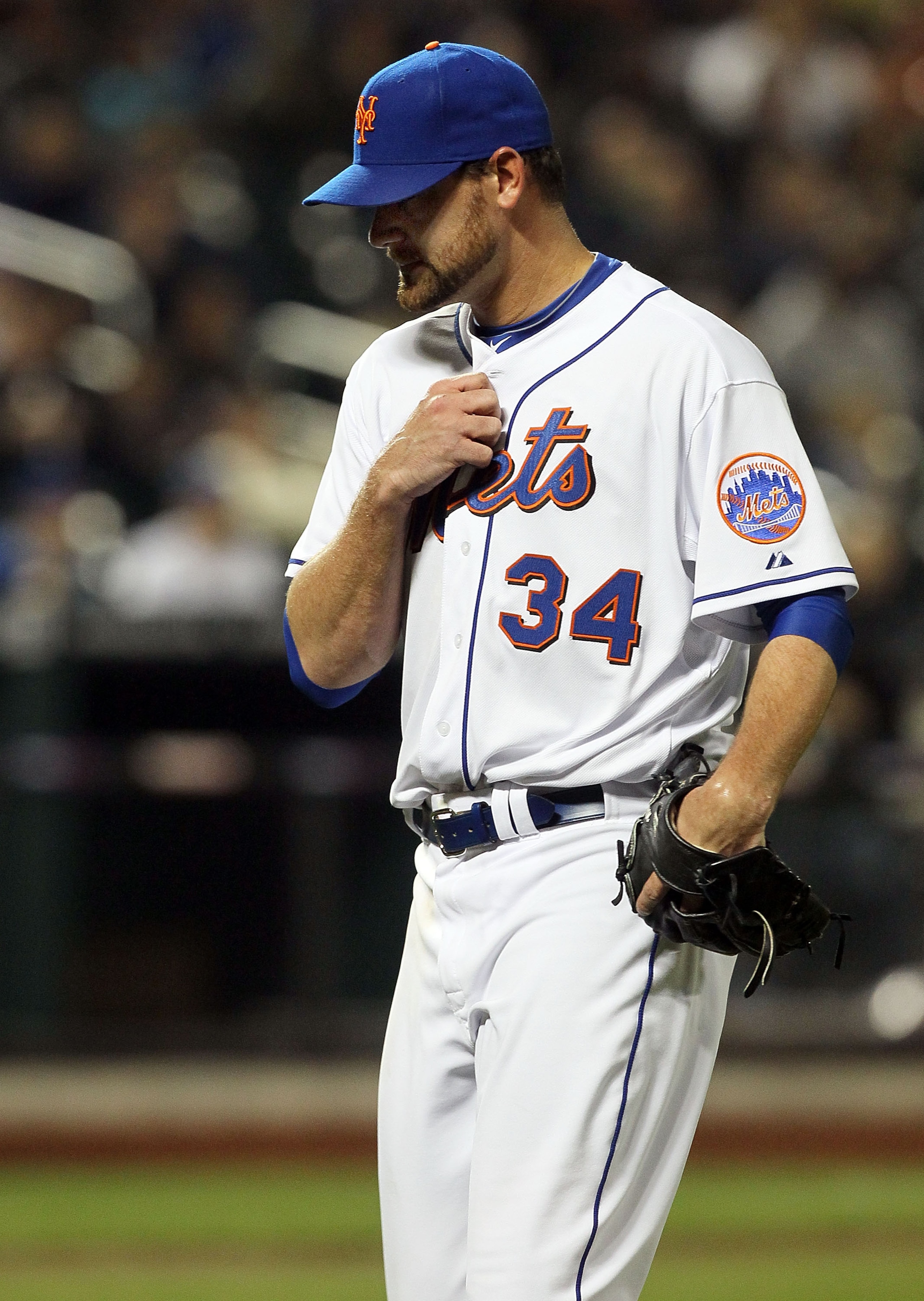 NEW YORK, NY - APRIL 11:  Mike Pelfrey #34 of the New York Mets leaves the game in the sixth inning against the Colorado Rockies on April 11, 2011 at Citi Field in the Flushing neighborhood of the Queens borough of New York City.  (Photo by Jim McIsaac/Ge