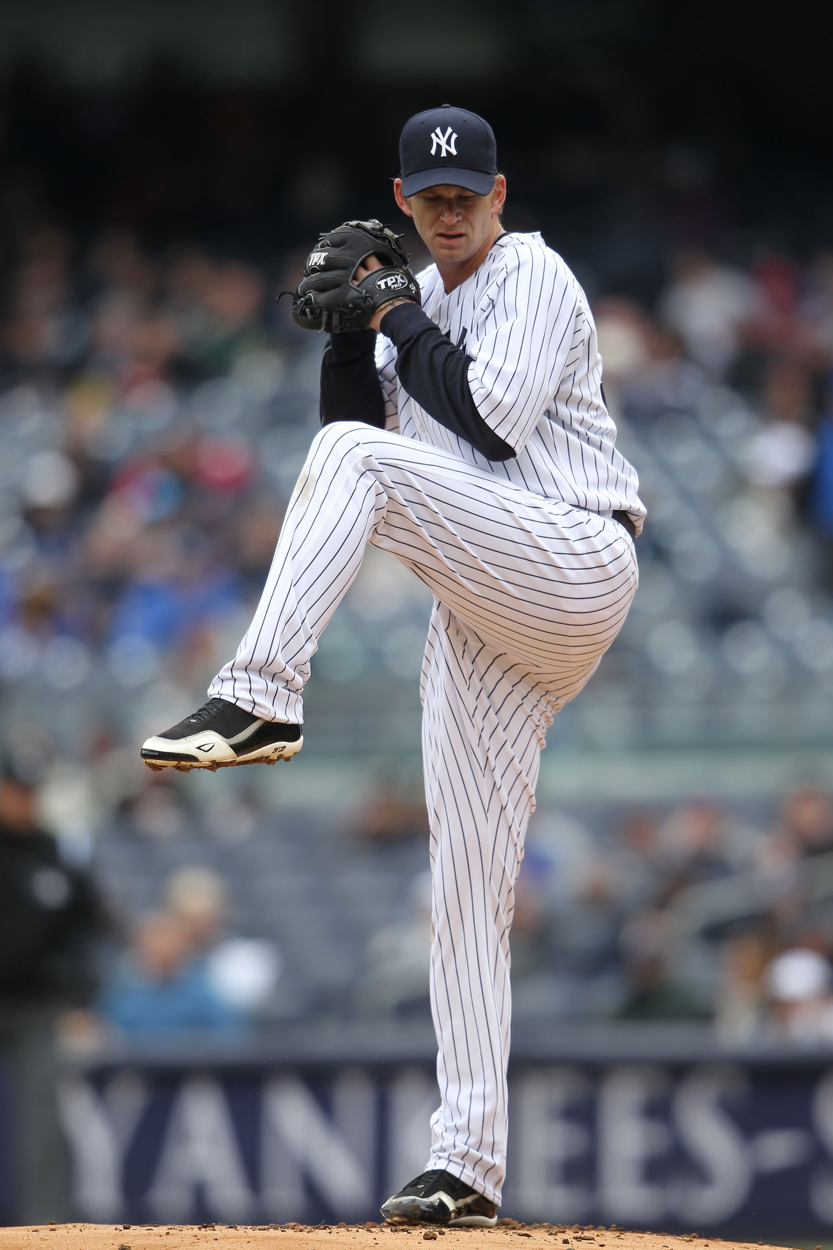 NEW YORK, NY - APRIL 07:  A.J. Burnett #34 of the New York Yankees pitches against the Minnesota Twins at Yankee Stadium on April 7, 2011 in the Bronx borough of New York City.  (Photo by Nick Laham/Getty Images)
