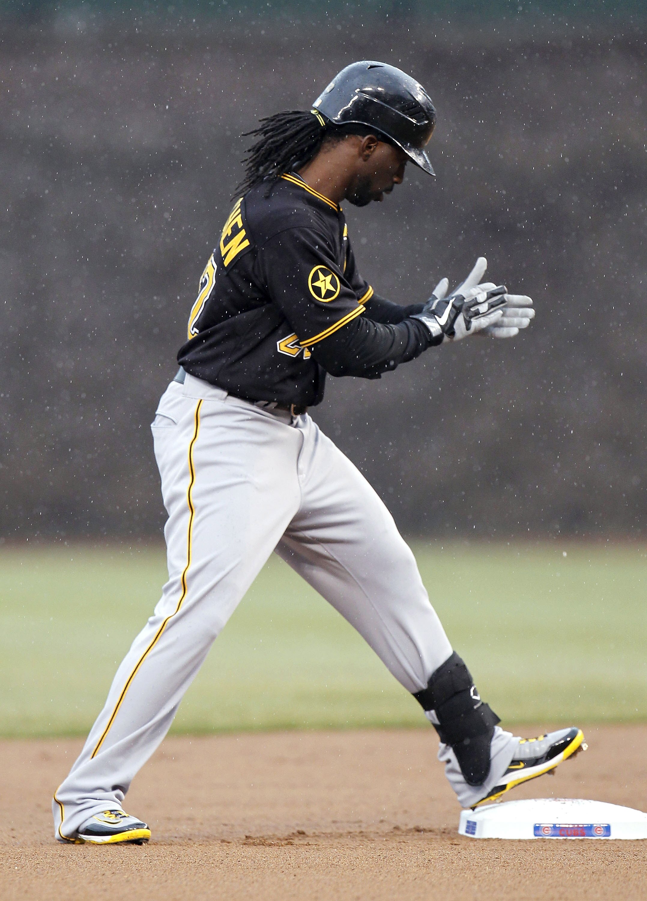 CHICAGO, IL - APRIL 01:  Andrew McCutchen #22 of the Pittsburgh Pirates reacts after hitting a first inning double while playing the Chicago Cubs on opening day at Wrigley Field on April 1, 2011 in Chicago, Illinois. Pittsburgh won the game 6-3.  (Photo b