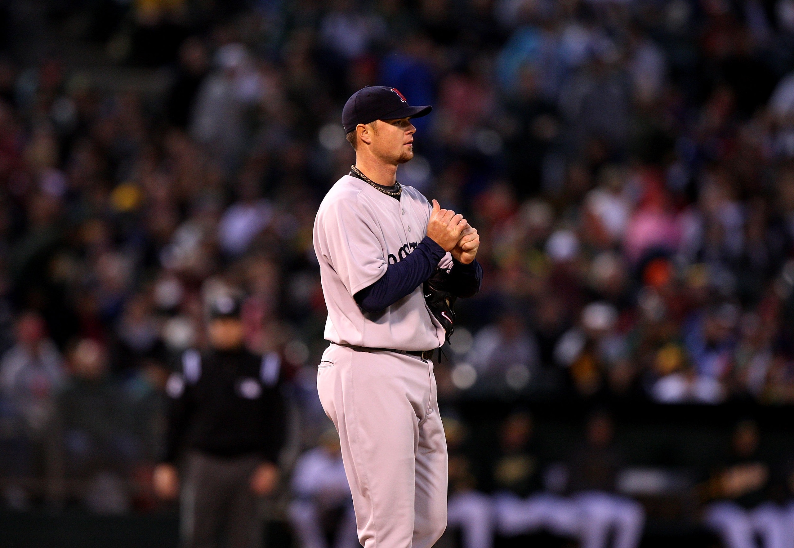 OAKLAND, CA - APRIL 13: John Lester #31 of the Boston Red Sox looks on after giving up four runs in the second inning against the Oakland Athletics during a Major League Baseball game on April 13, 2009 at the Oakland Coliseum in Oakland, California. (Ph OAKLAND, CA - APRIL 13: John Lester #31 of the Boston Red Sox looks on after giving up four runs in the second inning against the Oakland Athletics during a Major League Baseball game on April 13, 2009 at the Oakland Coliseum in Oakland, California. (Ph