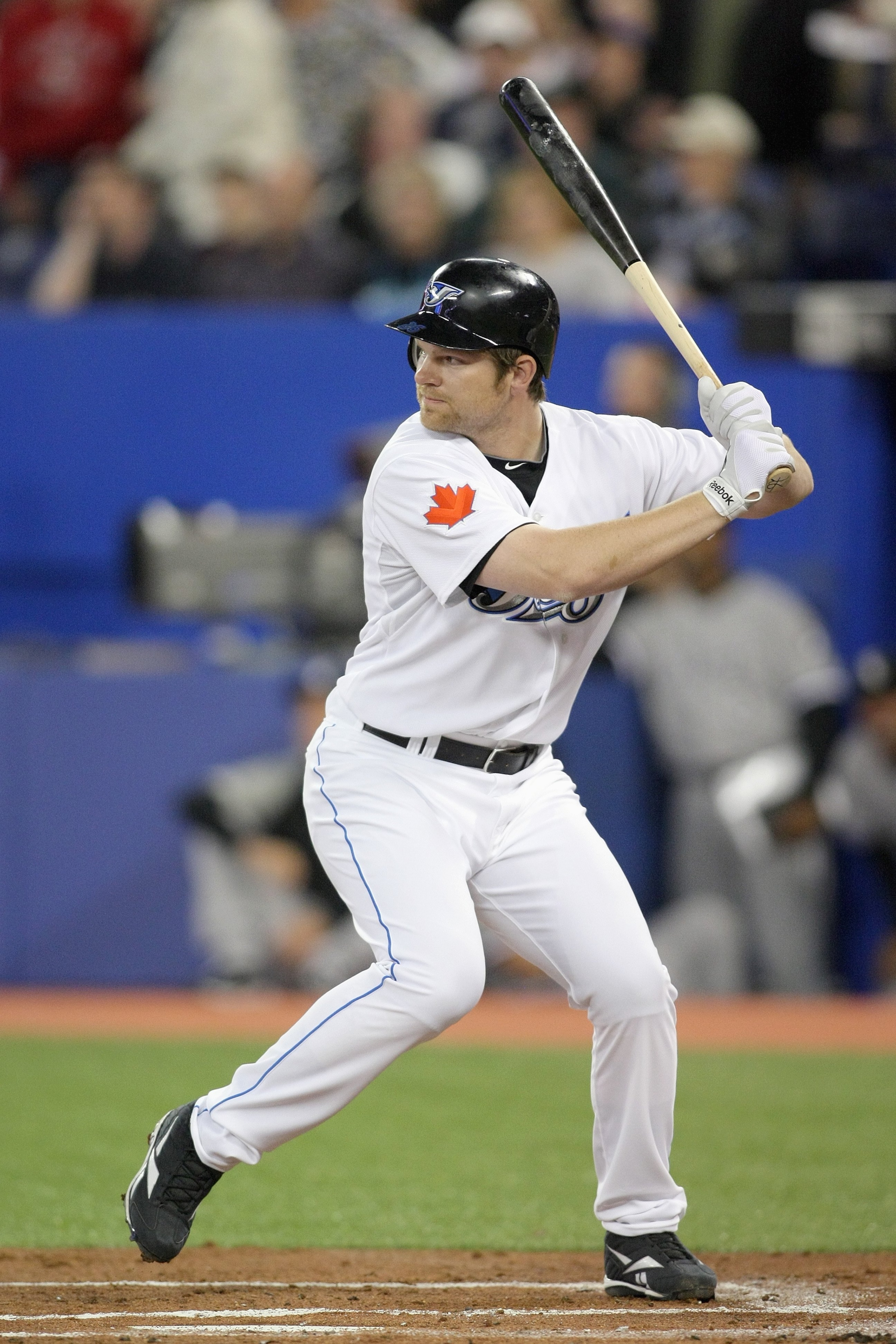 TORONTO - APRIL 12:  Adam Lind #26 of the Toronto Blue Jays stands at bat during the game against the Chicago White Sox at the Rogers Centre on April 12, 2010 in Toronto, Ontario. (Photo By Dave Sandford/Getty Images)