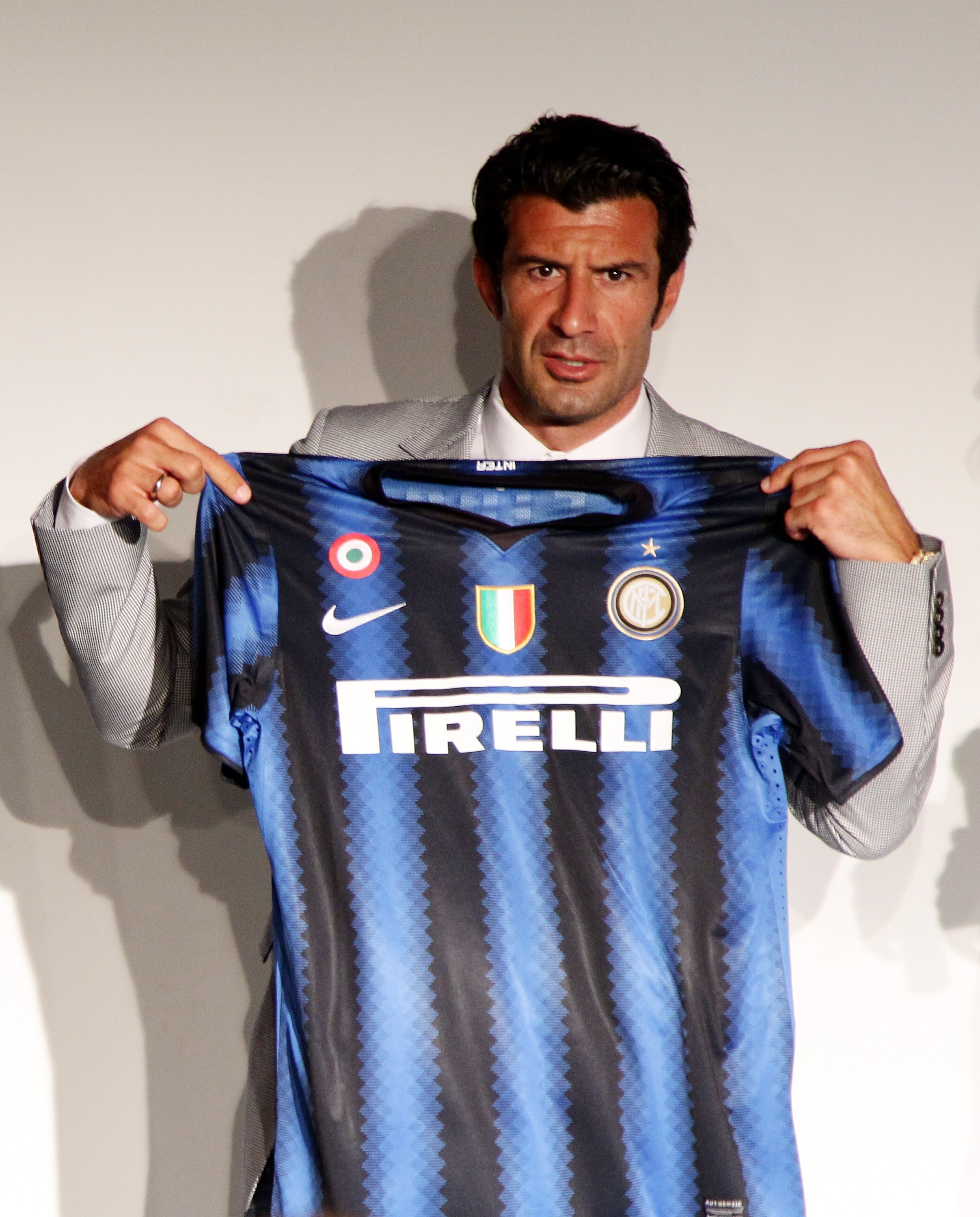 MILAN, ITALY - JULY 14: Luis Figo shows the F.C. Internazionale Milano new shirt on July 14, 2010 in Milan, Italy.  (Photo by Vittorio Zunino Celotto/Getty Images)
