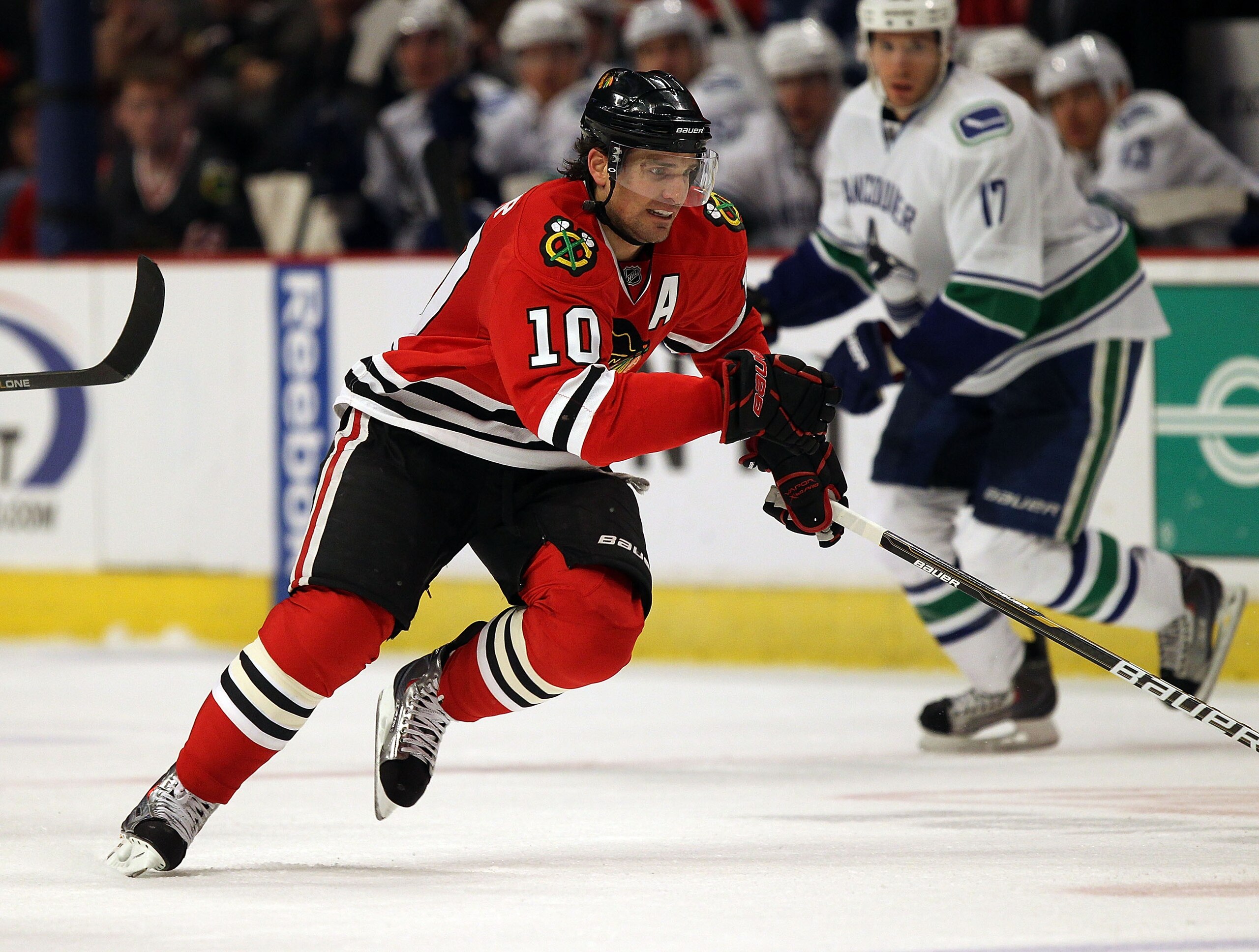 CHICAGO, IL - DECEMBER 03: Patrick Sharp #10 of the Chicago Blackhawks skates up the ice against the Vancouver Canucks at the United Center on December 3, 2010 in Chicago, Illinois. The Canucks defeated the Blackhawks 3-0. (Photo by Jonathan Daniel/Getty CHICAGO, IL - DECEMBER 03: Patrick Sharp #10 of the Chicago Blackhawks skates up the ice against the Vancouver Canucks at the United Center on December 3, 2010 in Chicago, Illinois. The Canucks defeated the Blackhawks 3-0. (Photo by Jonathan Daniel/Getty