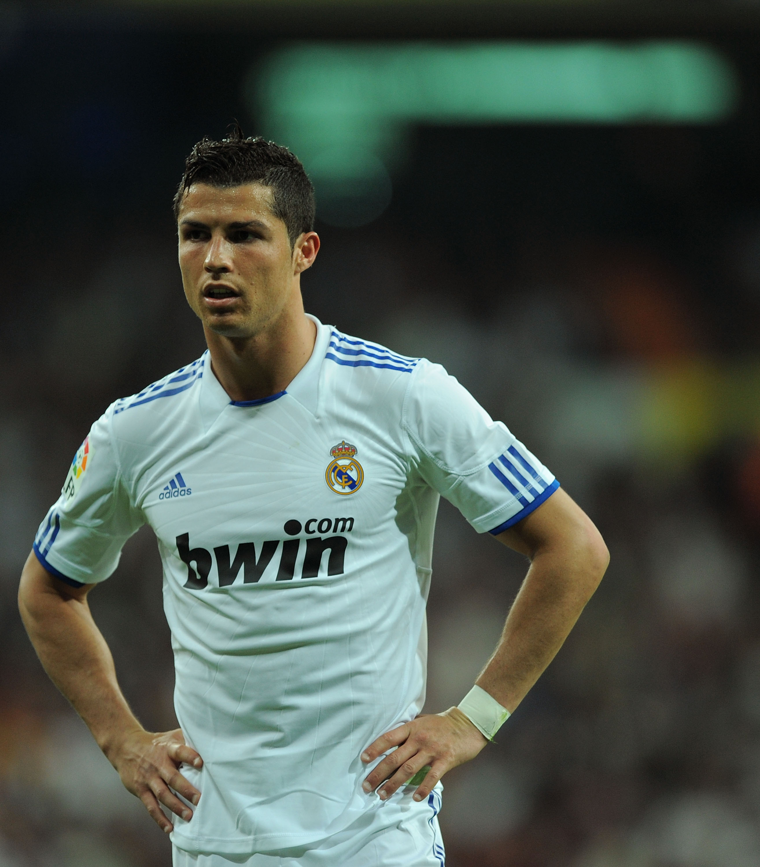 MADRID, SPAIN - APRIL 16:  Cristiano Ronaldo of Real Madrid waits for play to resume during the La Liga match between Real Madrid and Barcelona at Estadio Santiago Bernabeu on April 16, 2011 in Madrid, Spain.  (Photo by Denis Doyle/Getty Images)