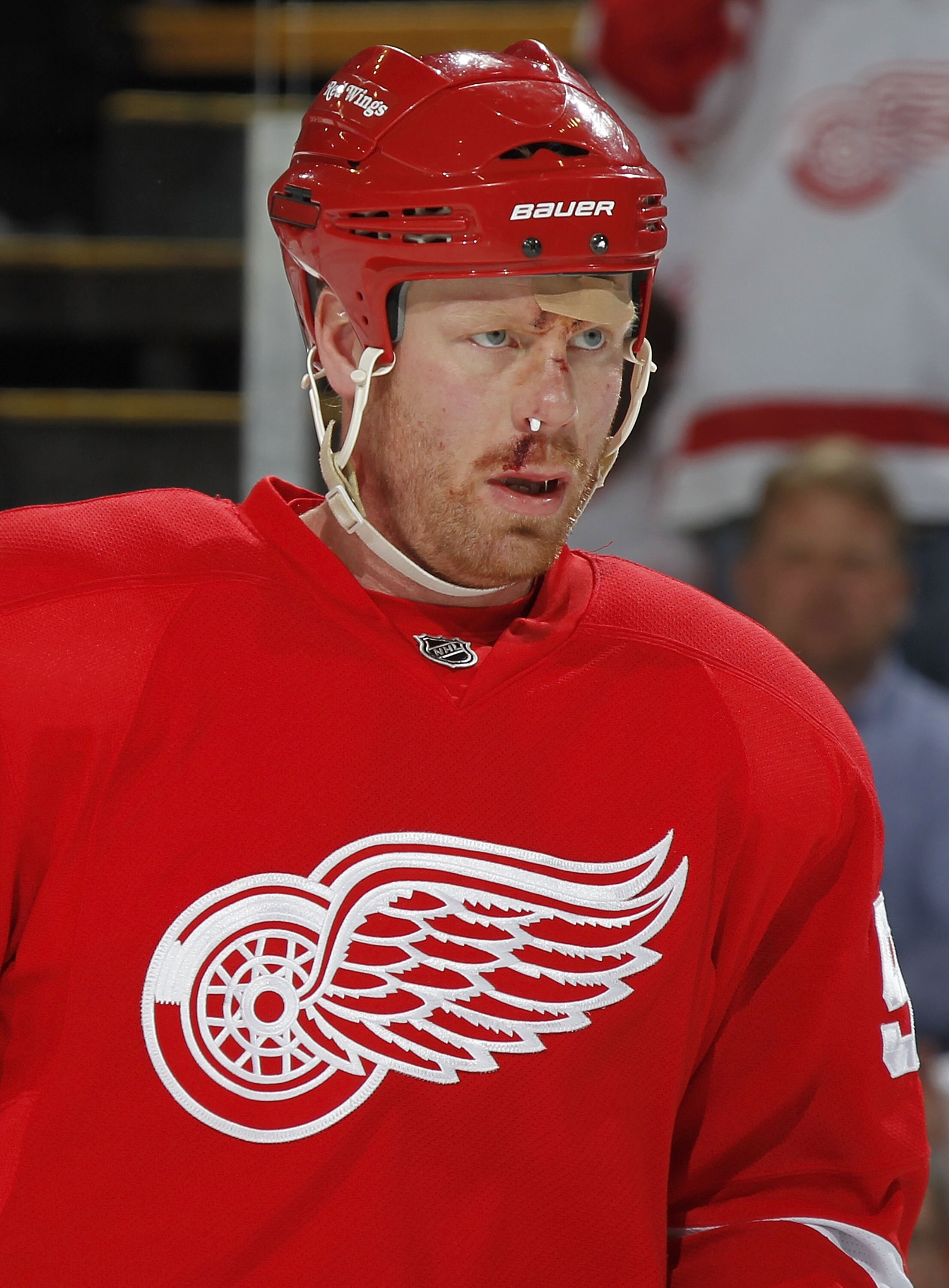 DETROIT, MI - APRIL 16:  Johan Franzen #93 of the Detroit Red Wings returns to the game in the second period after being badly cut on the face in the first period while playing the Phoenix Coyotes in Game Two of the Western Conference Quarterfinals during