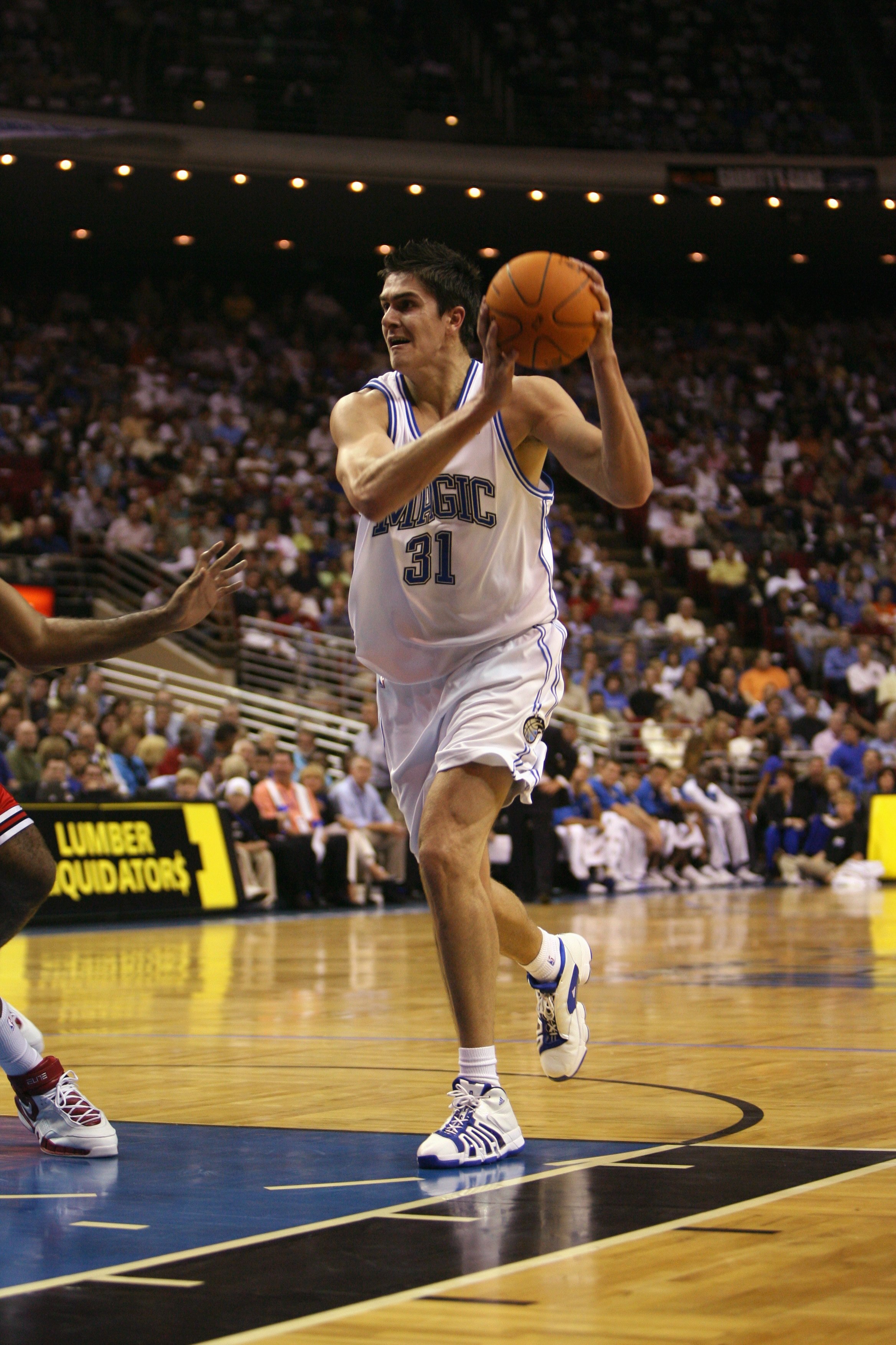 ORLANDO, FL - NOVEMBER 1:  Darko Milicic #31 of the Orlando Magic holds the ball against the Chicago Bulls on November 1, 2006 at TD Waterhouse Centre in Orlando, Florida. The Magic won 109-94. NOTE TO USER: User expressly acknowledges and agrees that, by