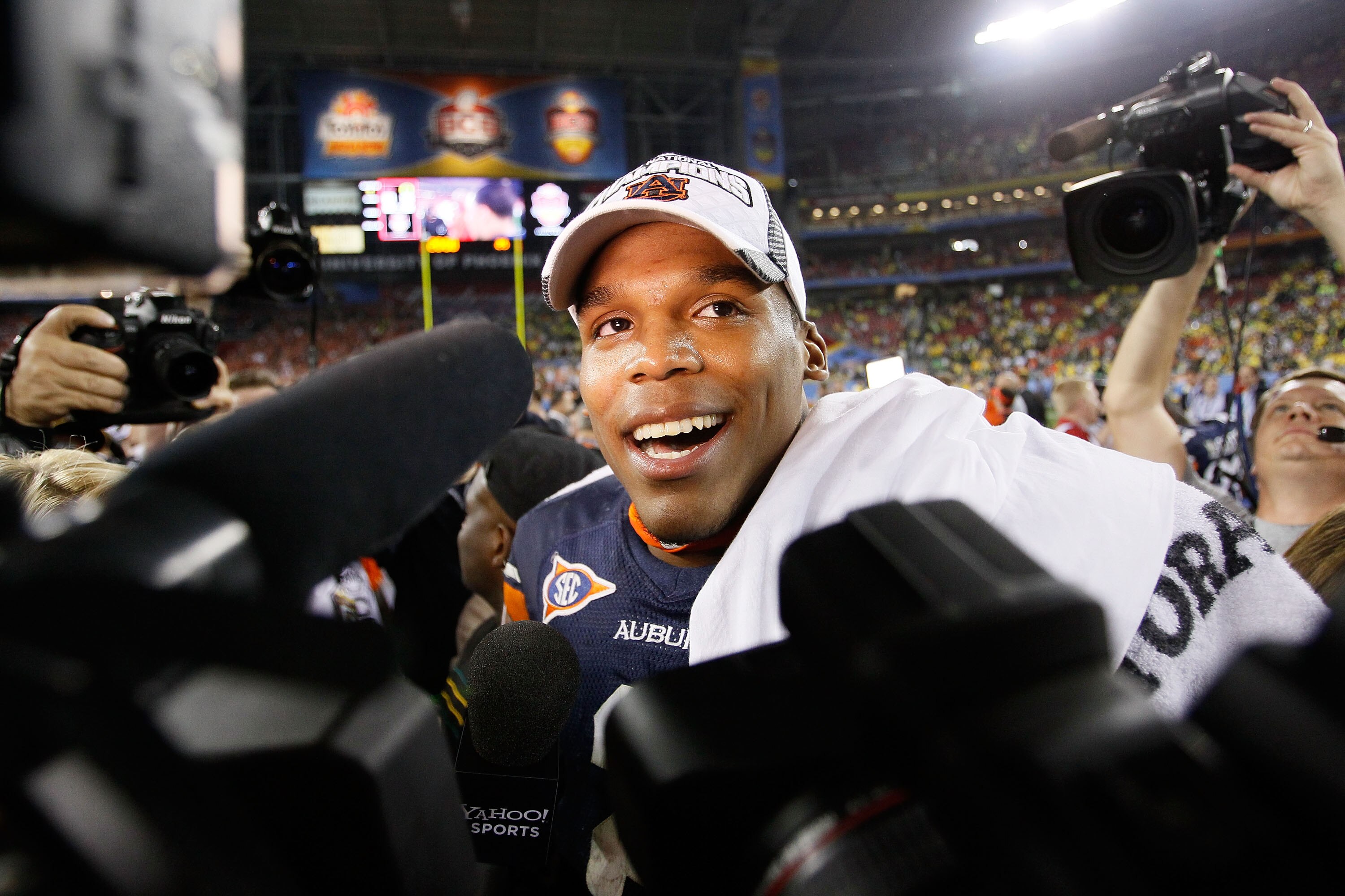 GLENDALE, AZ - JANUARY 10:  Quarterback Cameron Newton #2 of the Auburn Tigers celebrates the Tigers 22-19 victory against the Oregon Ducks in the Tostitos BCS National Championship Game at University of Phoenix Stadium on January 10, 2011 in Glendale, Ar
