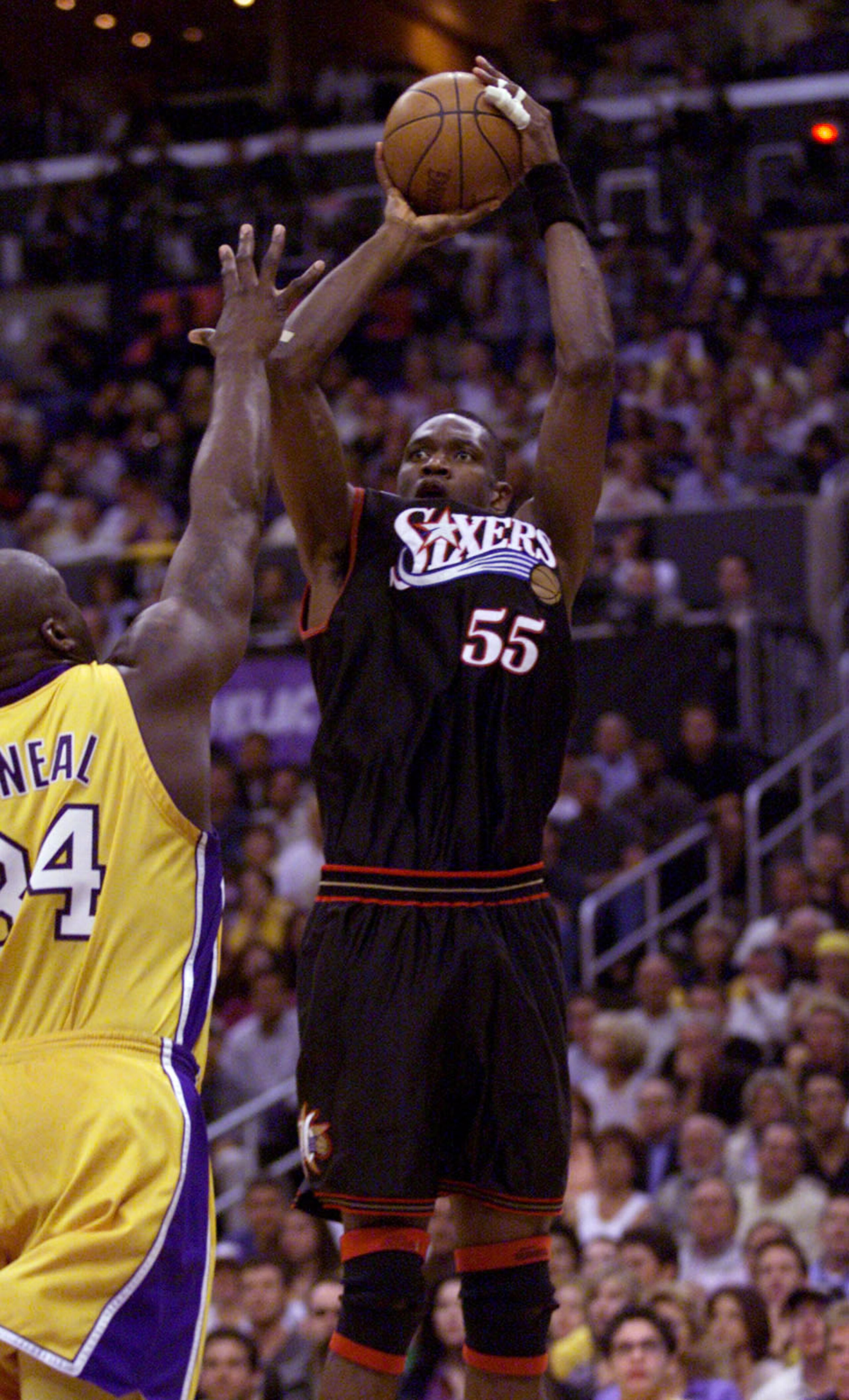 8 Jun 2001:  Dikembe Mutombo #55 of the Philadelphia 76ers puts a shot over Shaquille O''Neal #34 of the Los Angeles Lakers during Game 2 of the NBA Finals at the Staples Center in Los Angeles, California.  DIGITAL IMAGE Mandatory Credit: Jed Jacobsohn/AL