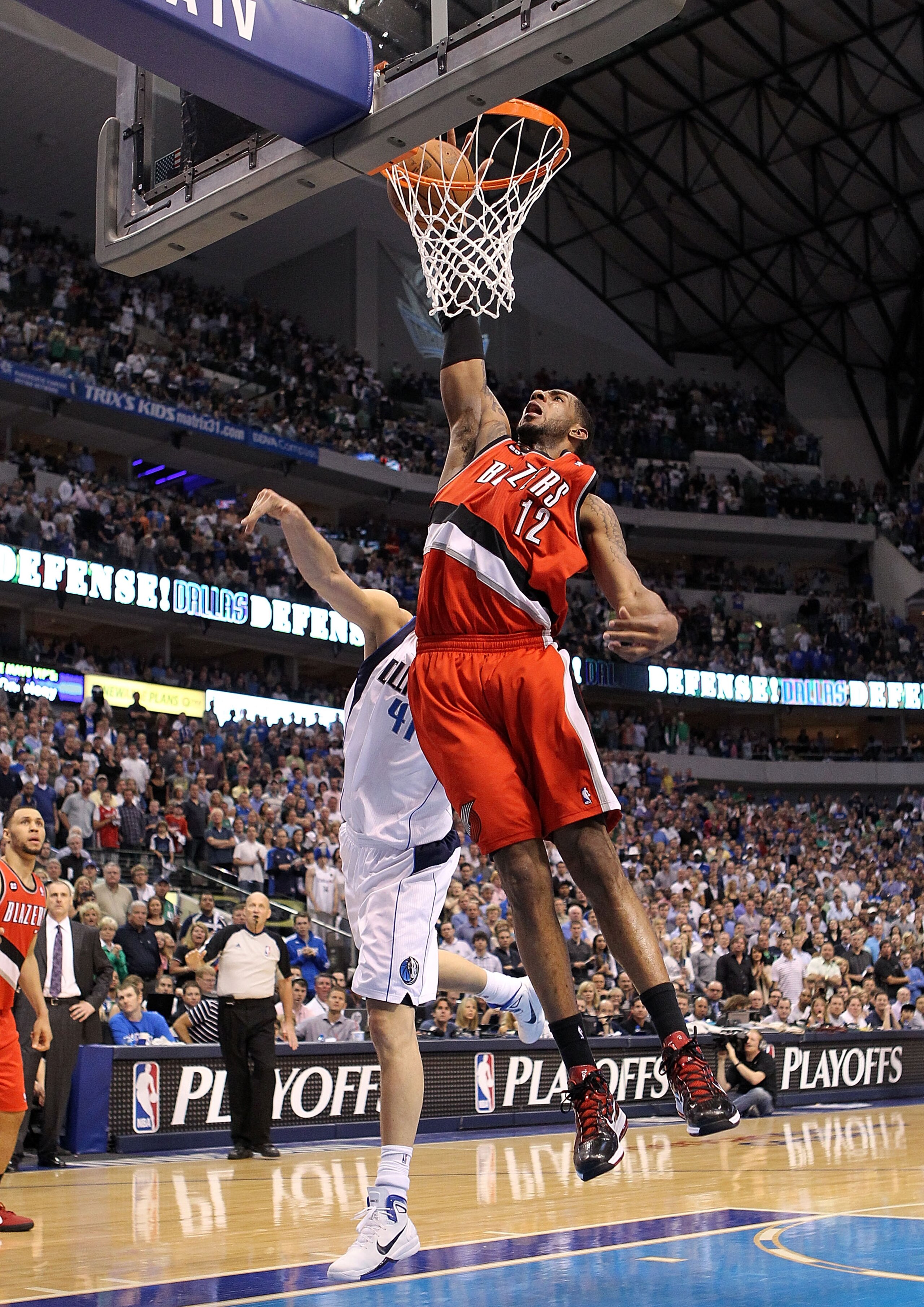DALLAS, TX - APRIL 16:  Forward LaMarcus Aldridge #12 of the Portland Trail Blazers gets a slam dunk against the Dallas Mavericks in Game One of the Western Conference Quarterfinals during the 2011 NBA Playoffs on April 16, 2011 at American Airlines Cente