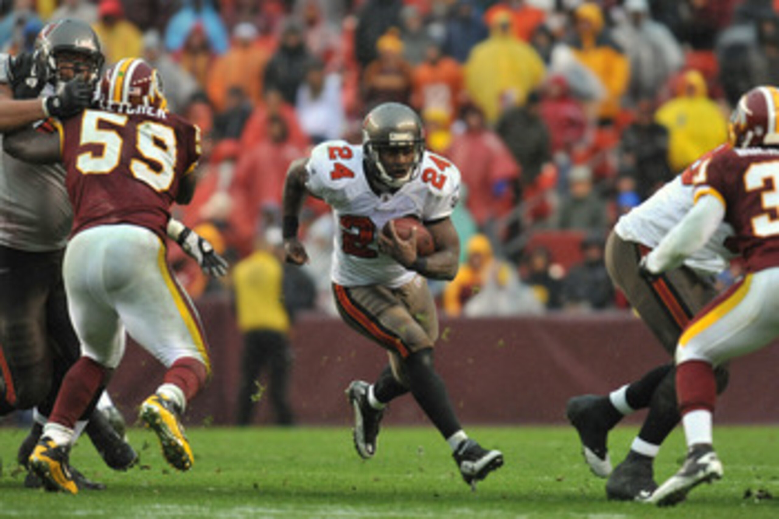 LANDOVER, MD - DECEMBER 12:  Carnell Williams #24 of the Tampa Bay Buccaneers runs the ball against the Washington Redskins  at FedExField on December 12, 2010 in Landover, Maryland. The Buccaneers defeated the Redskins 17-16. (Photo by Larry French/Getty