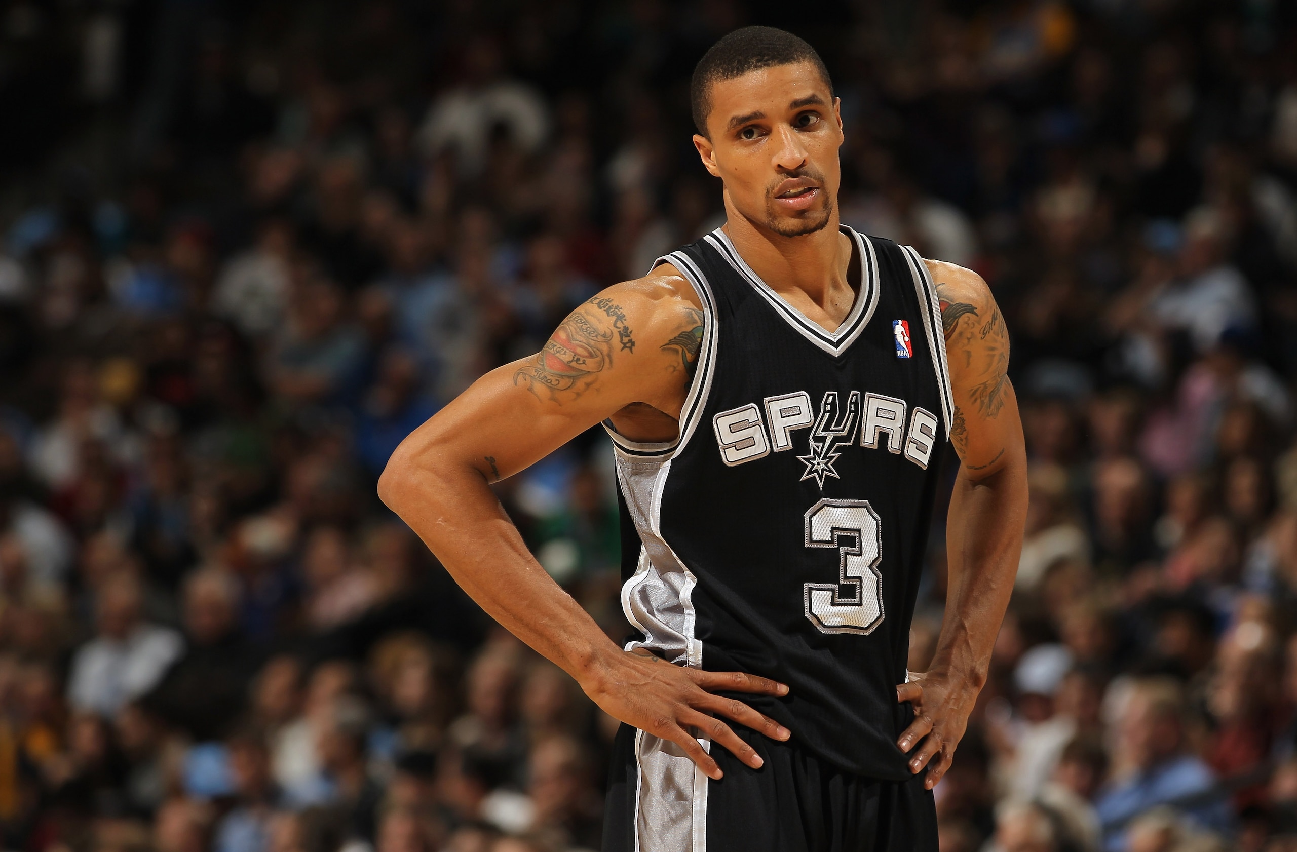 DENVER, CO - MARCH 23:  George Hill #3 of the San Antonio Spurs looks on during a break in the action against the Denver Nuggets at the Pepsi Center on March 23, 2011 in Denver, Colorado. The Nuggets defeated the Spurs 115-112. NOTE TO USER: User expressl