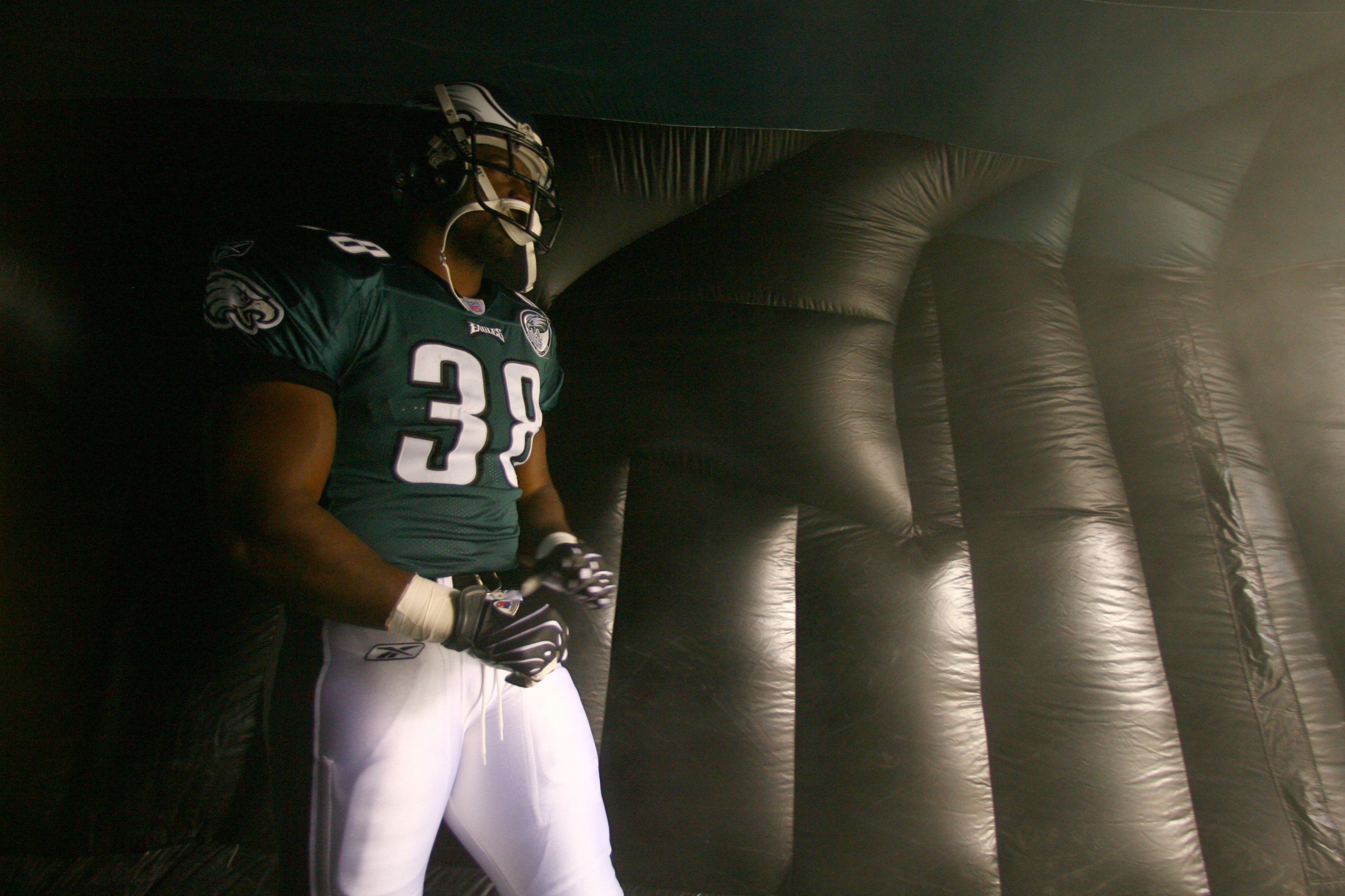 PHILADELPHIA - NOVEMBER 18:  Thomas Tapeh #38 of the Philadelphia Eagles enters the arena during the NFL game against the Miami Dolphins at Lincoln Financial Field on November 18, 2007 in Philadelphia, Pennsylvania. (Photo by Al Bello/Getty Images)