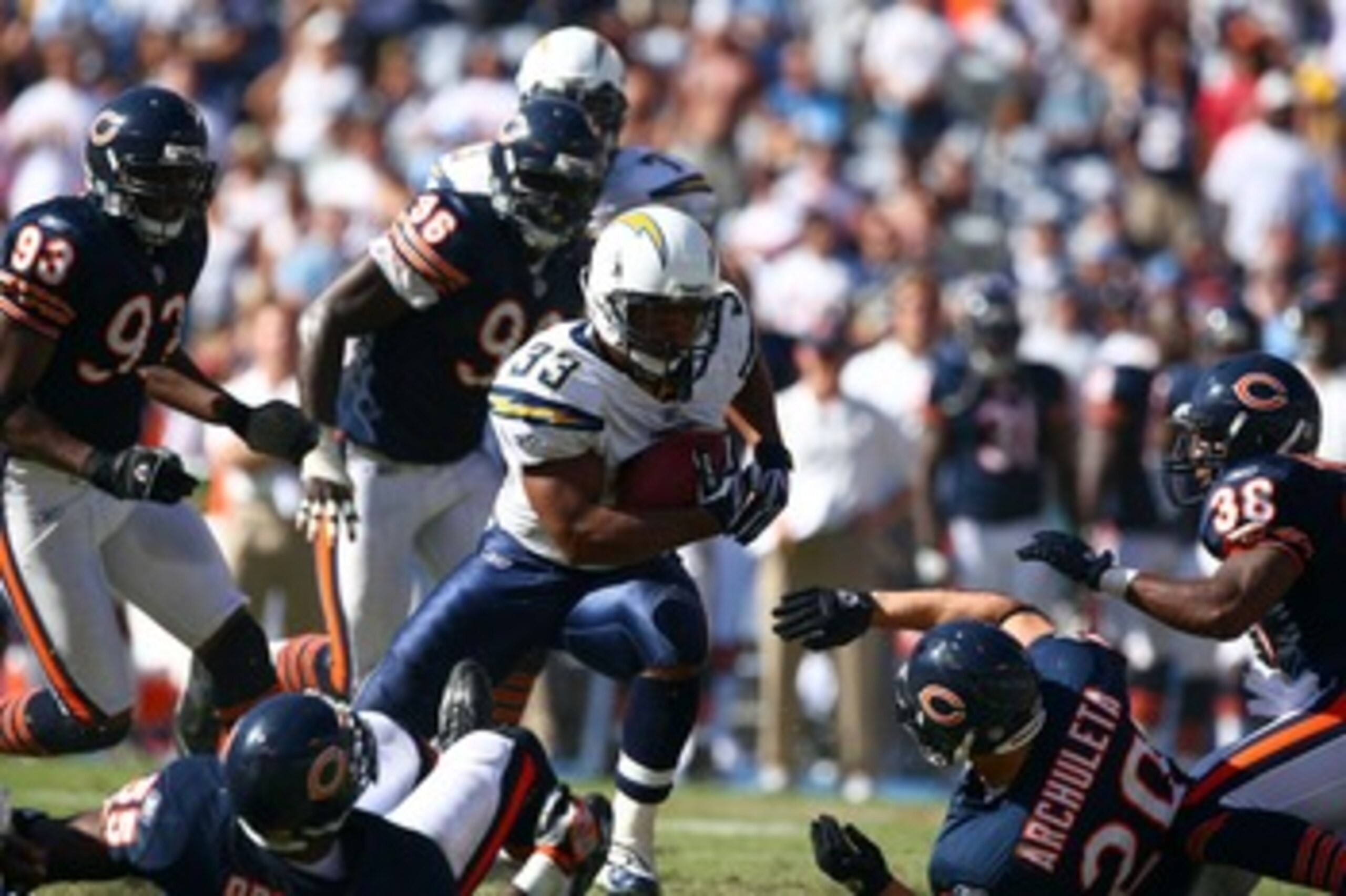 SAN DIEGO - SEPTEMBER 9:  Runningback Michael Turner #33 of the San Diego Chargers runs against the defense of the Chicago Bears at Qualcomm Stadium September 9, 2007 in San Diego, California.  (Photo by Donald Miralle/Getty Images)