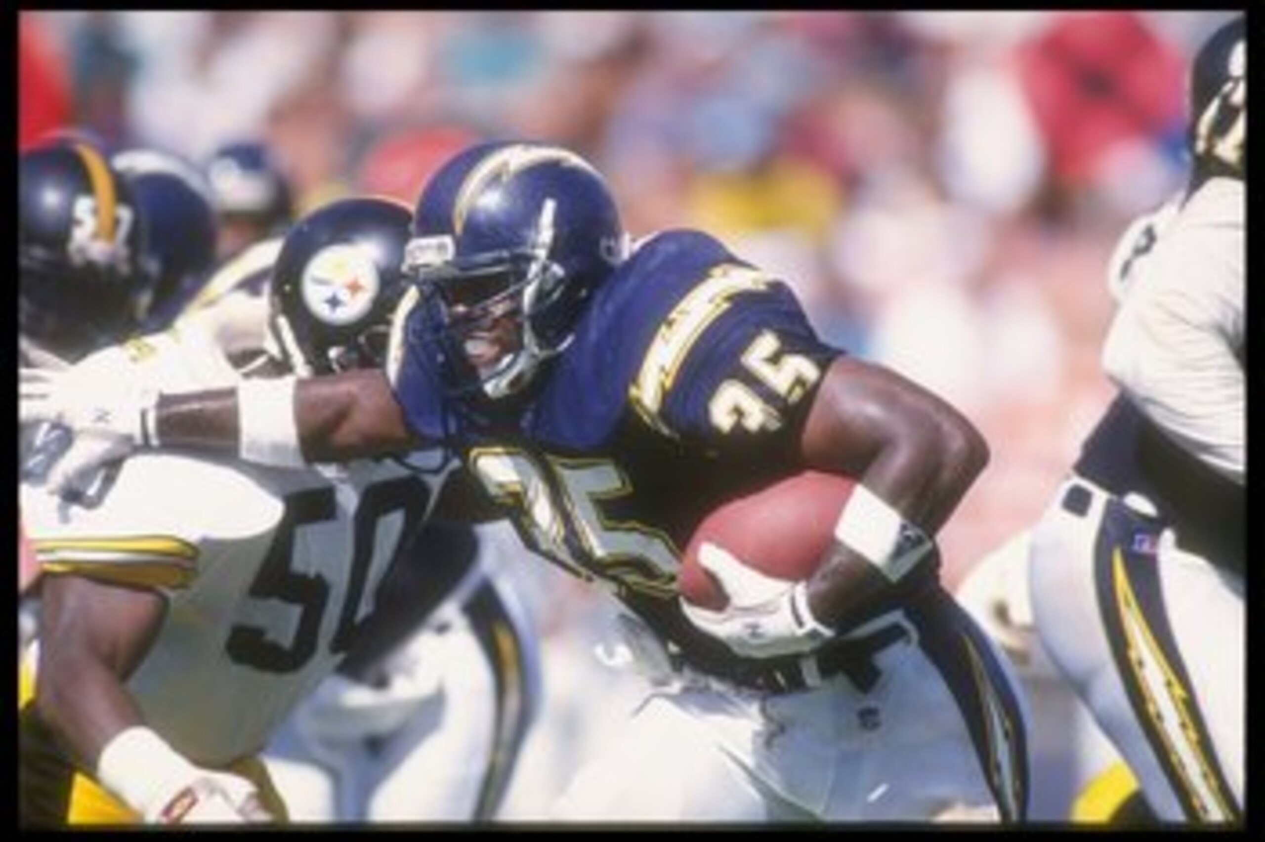 20 Sep 1992:  Running back Marion Butts #35 of the San Diego Chargers pushes through in a drive during a game with the Pittsburgh Steelers in the Jack Murphy Stadium in San Diego, California. The Steelers won the game, 23-6.  Mandatory Credit: Stephen Dun
