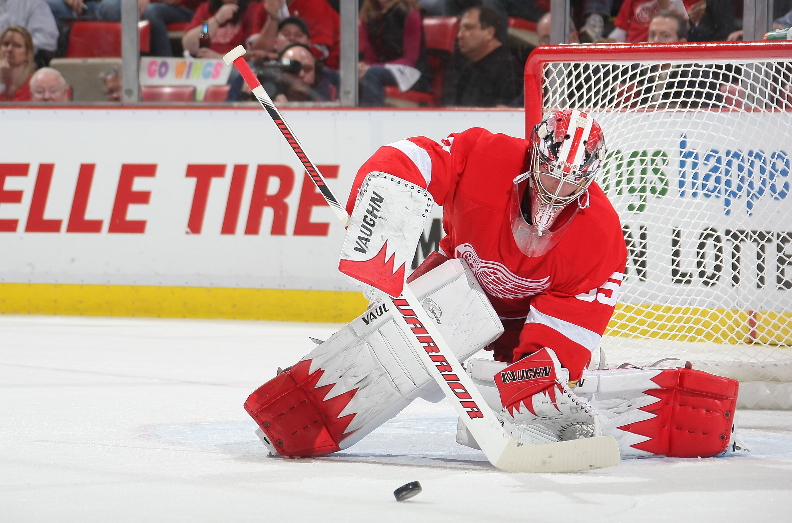DETROIT, MI- APRIL 13:  Jimmy Howard #35 of the Detroit Red Wings keeps an eye on puck against the Phoenix Coyotes in Game One of the Western Conference Quarterfinals during the 2011 NHL Stanley Cup Playoffs at Joe Louis Arena on April 13, 2011 in Detroit