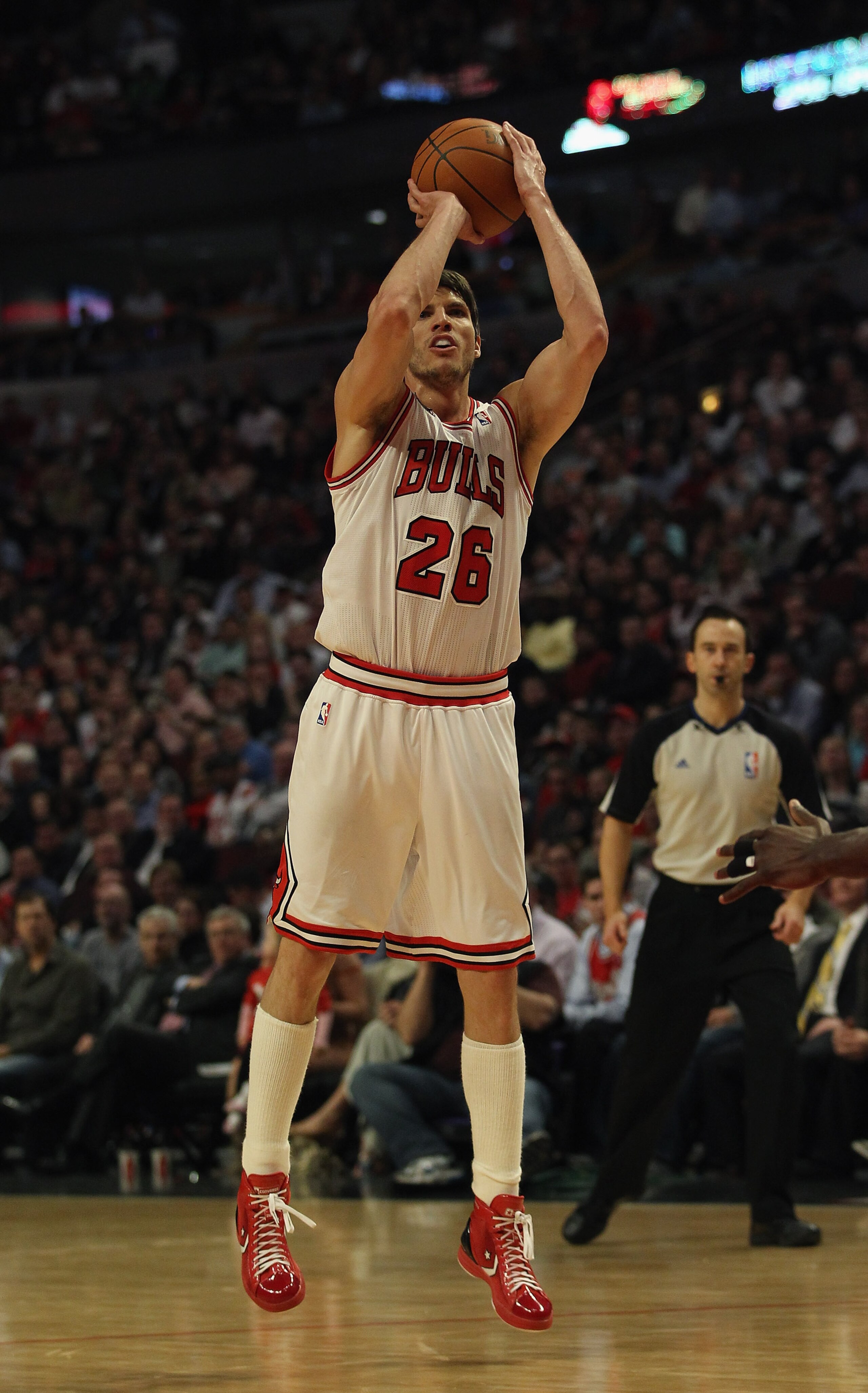 CHICAGO, IL - APRIL 13: Kyle Korver #26 of the Chicago Bulls puts up a shot on his way to 19 points against the New Jersey Nets at the United Center on April 13, 2011 in Chicago, Illinois. The Bulls defeated the Nets 97-92. NOTE TO USER: User expressly ac CHICAGO, IL - APRIL 13: Kyle Korver #26 of the Chicago Bulls puts up a shot on his way to 19 points against the New Jersey Nets at the United Center on April 13, 2011 in Chicago, Illinois. The Bulls defeated the Nets 97-92. NOTE TO USER: User expressly ac