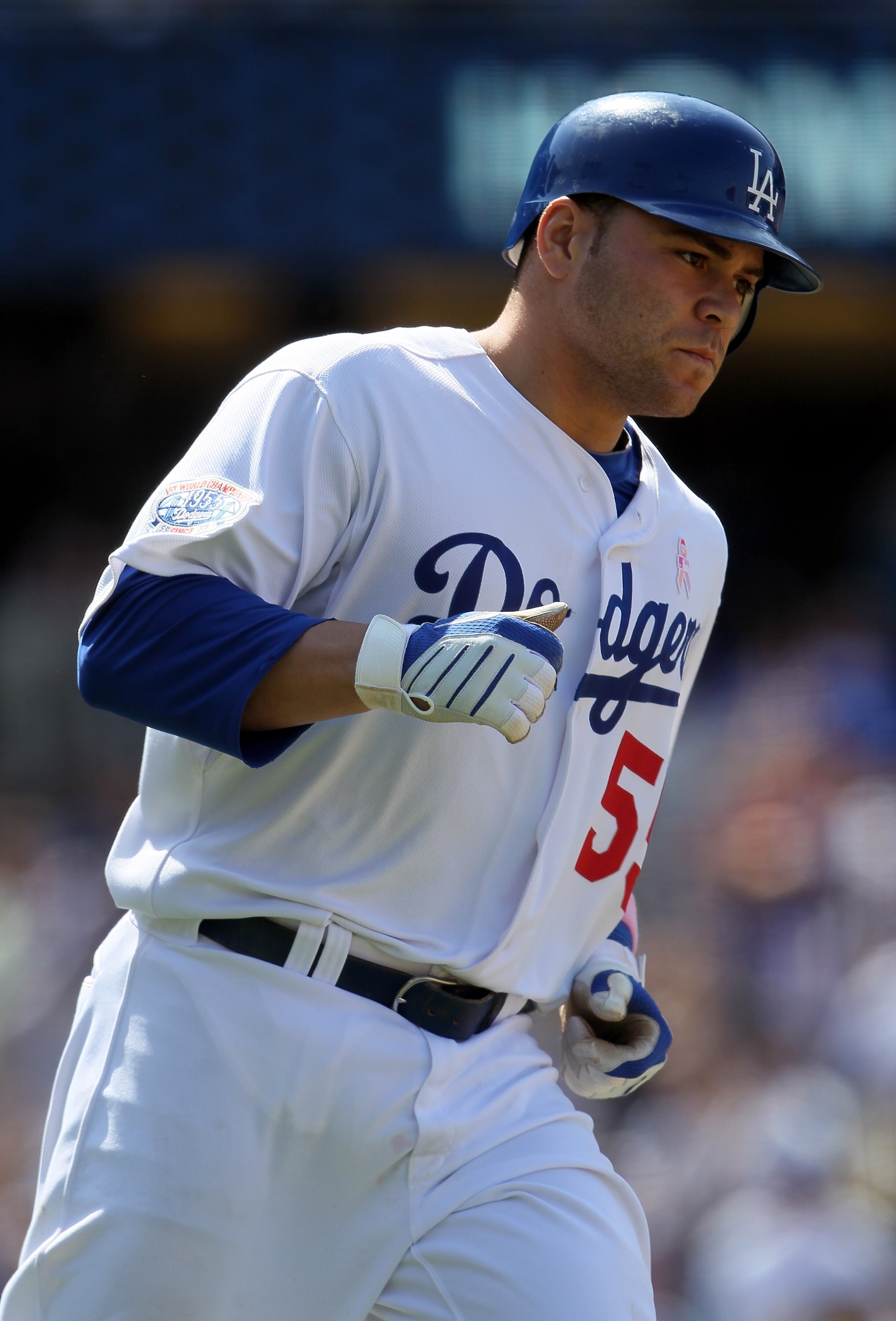 LOS ANGELES, CA - MAY 09:  Russell Martin #55 of the Los Angeles Dodgers rounds first base after hitting a solo homerun in the eighth inning against the Colorado Rockies at Dodger Stadium on May 9, 2010 in Los Angeles, California. The Dodgers defeated the