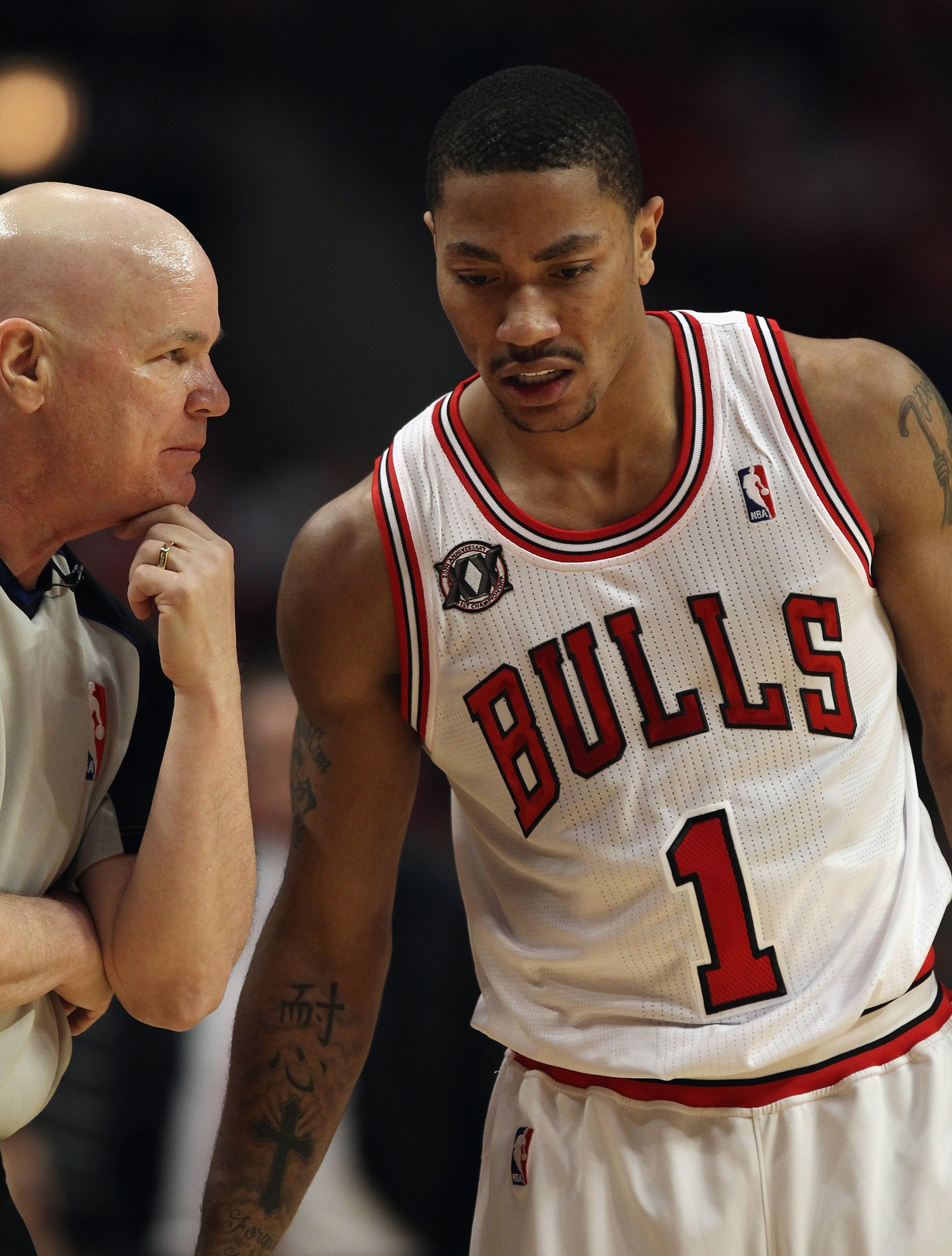CHICAGO, IL - APRIL 16: Derrick Rose #1 of the Chicago Bulls listens to referee Joe Crawford #17 after a foul call against the Indiana Pacers in Game One of the Eastern Conference Quarterfinals in the 2011 NBA Playoffs at the United Center on April 16, 20 CHICAGO, IL - APRIL 16: Derrick Rose #1 of the Chicago Bulls listens to referee Joe Crawford #17 after a foul call against the Indiana Pacers in Game One of the Eastern Conference Quarterfinals in the 2011 NBA Playoffs at the United Center on April 16, 20