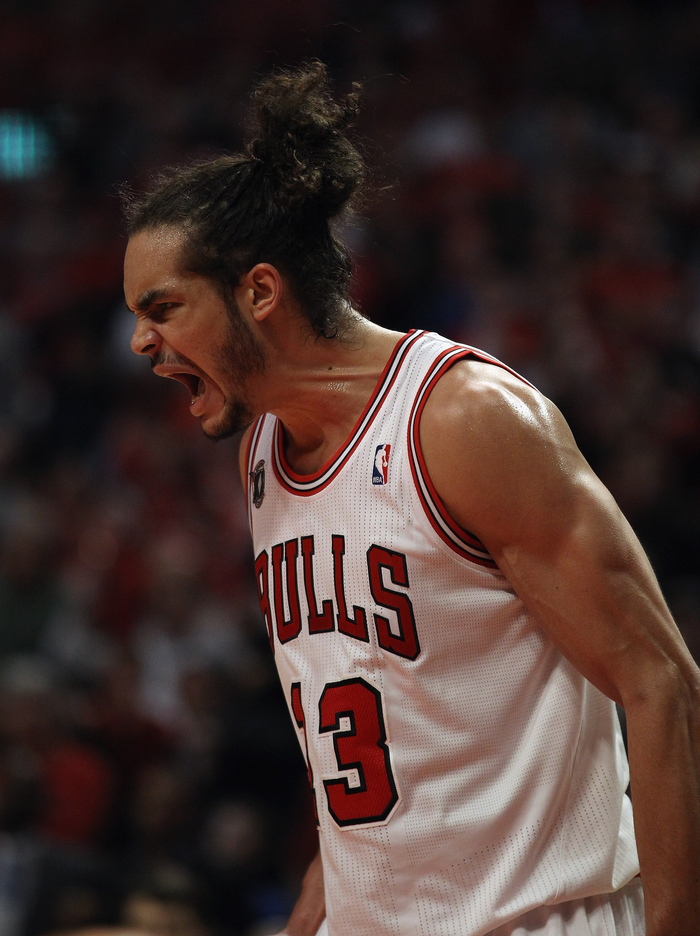CHICAGO, IL - APRIL 16: Joakim Noah #13 of the Chicago Bulls celebrates a win over the Indiana Pacers in Game One of the Eastern Conference Quarterfinals in the 2011 NBA Playoffs at the United Center on April 16, 2011 in Chicago, Illinois. The Bulls defea