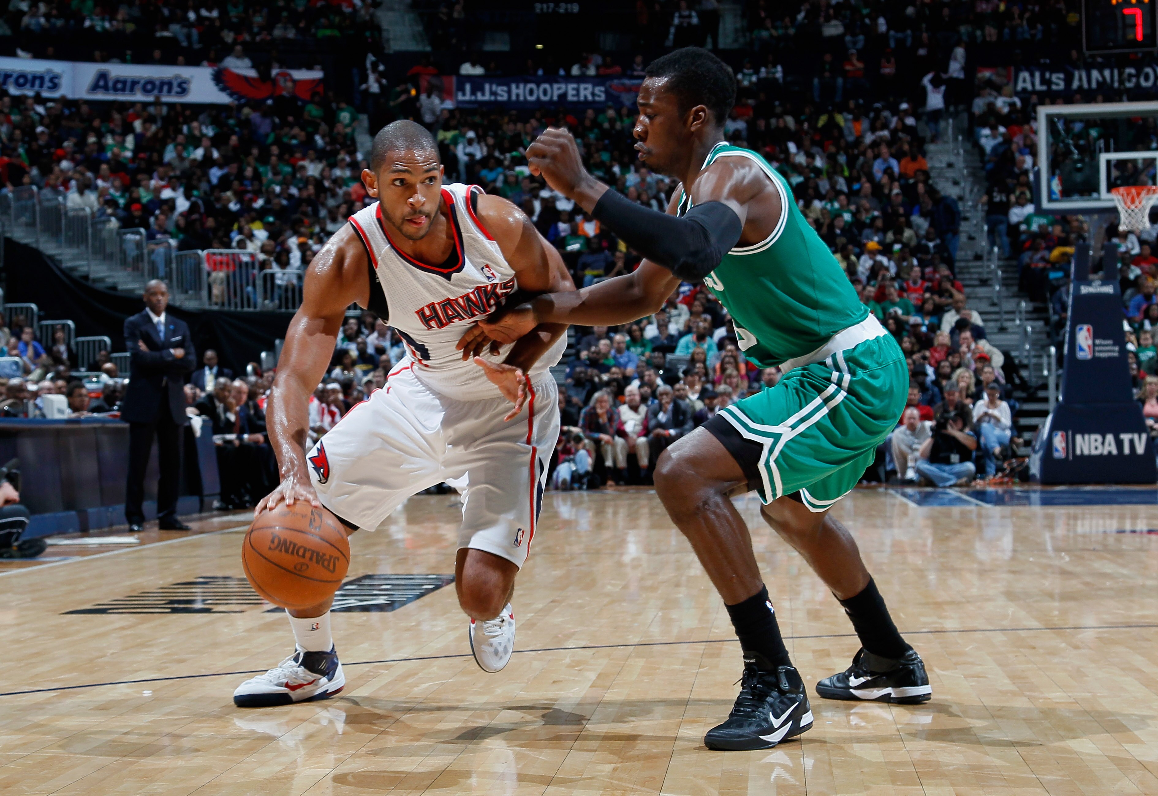 ATLANTA, GA - APRIL 01:  Al Horford #15 of the Atlanta Hawks against Jeff Green #8 of the Boston Celtics at Philips Arena on April 1, 2011 in Atlanta, Georgia.  NOTE TO USER: User expressly acknowledges and agrees that, by downloading and/or using this Ph