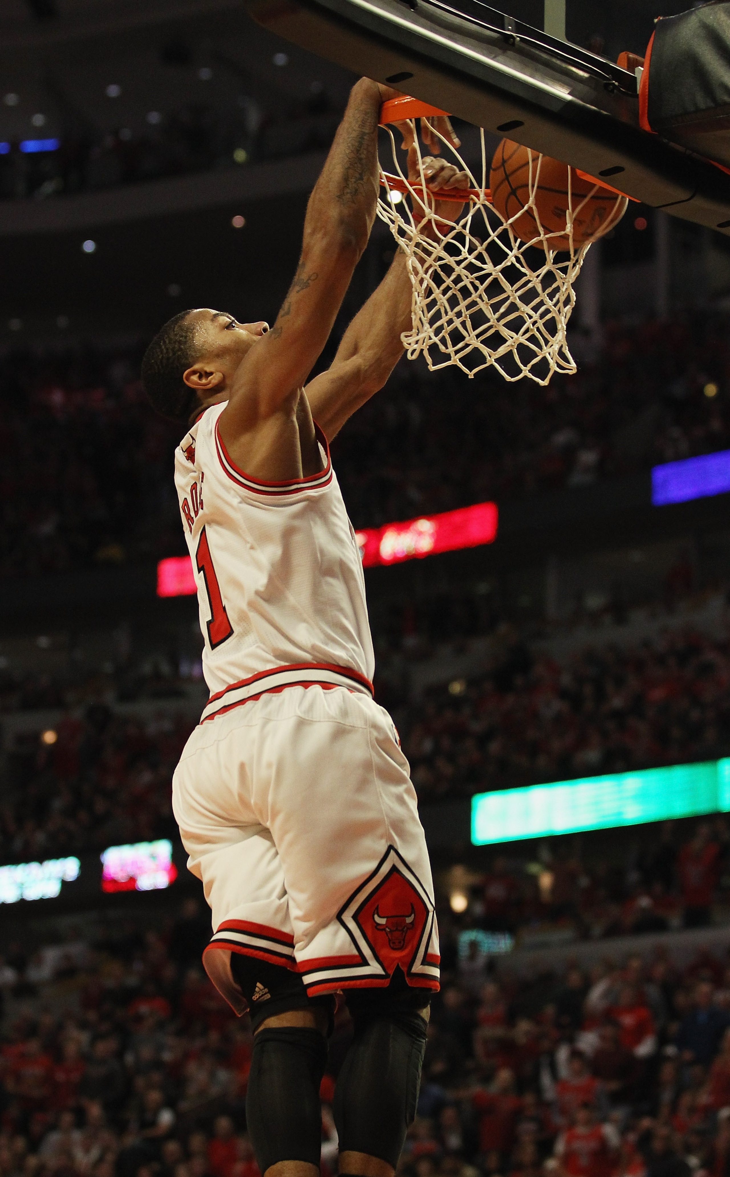 CHICAGO, IL - APRIL 16: Derrick Rose #1 of the Chicago Bulls dunks the ball against the Indiana Pacers in Game One of the Eastern Conference Quarterfinals in the 2011 NBA Playoffs at the United Center on April 16, 2011 in Chicago, Illinois. The Bulls defe CHICAGO, IL - APRIL 16: Derrick Rose #1 of the Chicago Bulls dunks the ball against the Indiana Pacers in Game One of the Eastern Conference Quarterfinals in the 2011 NBA Playoffs at the United Center on April 16, 2011 in Chicago, Illinois. The Bulls defe