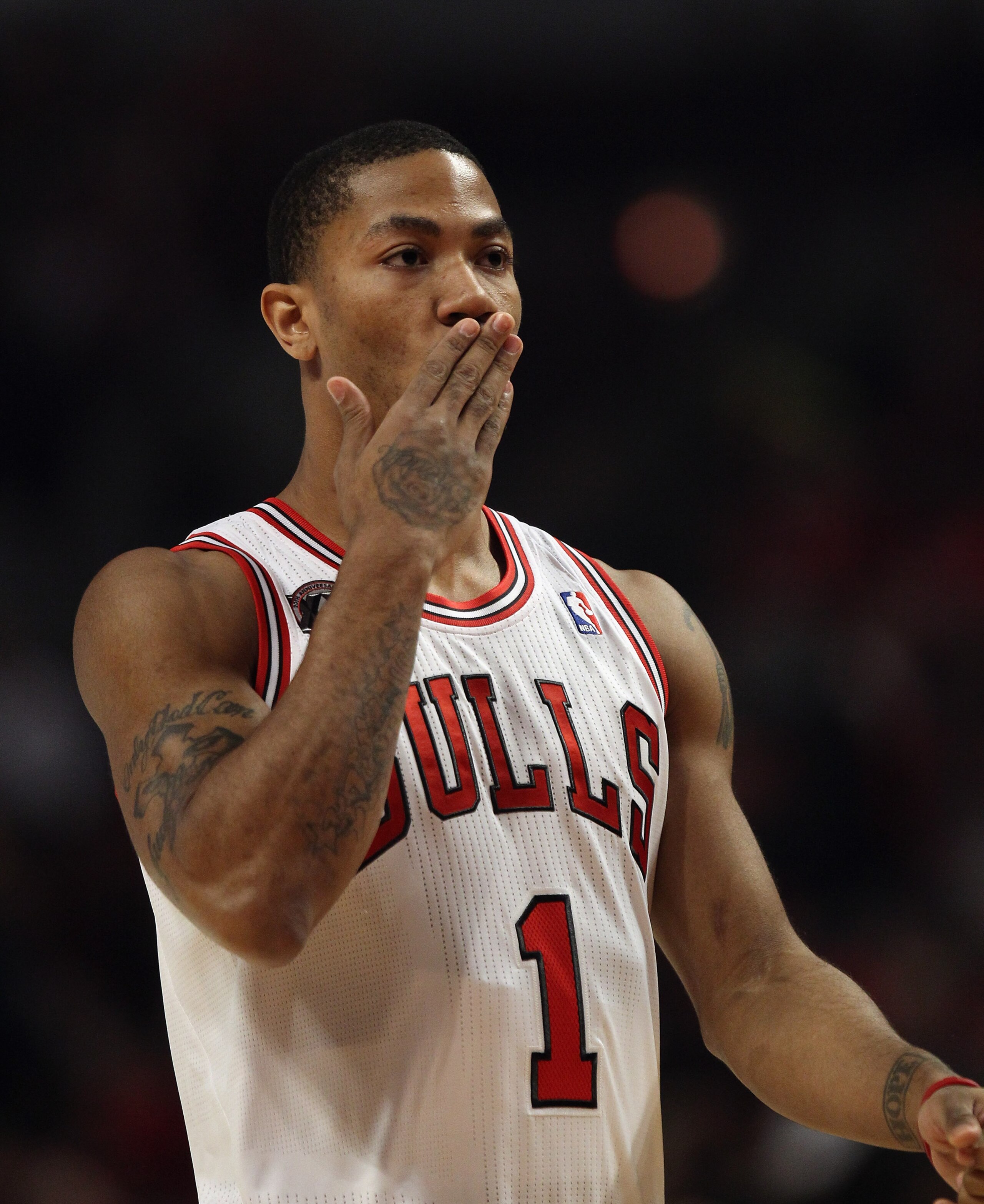 CHICAGO, IL - APRIL 16: Derrick Rose #1 of the Chicago Bulls blows a kiss to family members before Game One of the Eastern Conference Quarterfinals in the 2011 NBA Playoffs against the Indiana Pacers at the United Center on April 16, 2011 in Chicago, Ill CHICAGO, IL - APRIL 16: Derrick Rose #1 of the Chicago Bulls blows a kiss to family members before Game One of the Eastern Conference Quarterfinals in the 2011 NBA Playoffs against the Indiana Pacers at the United Center on April 16, 2011 in Chicago, Ill