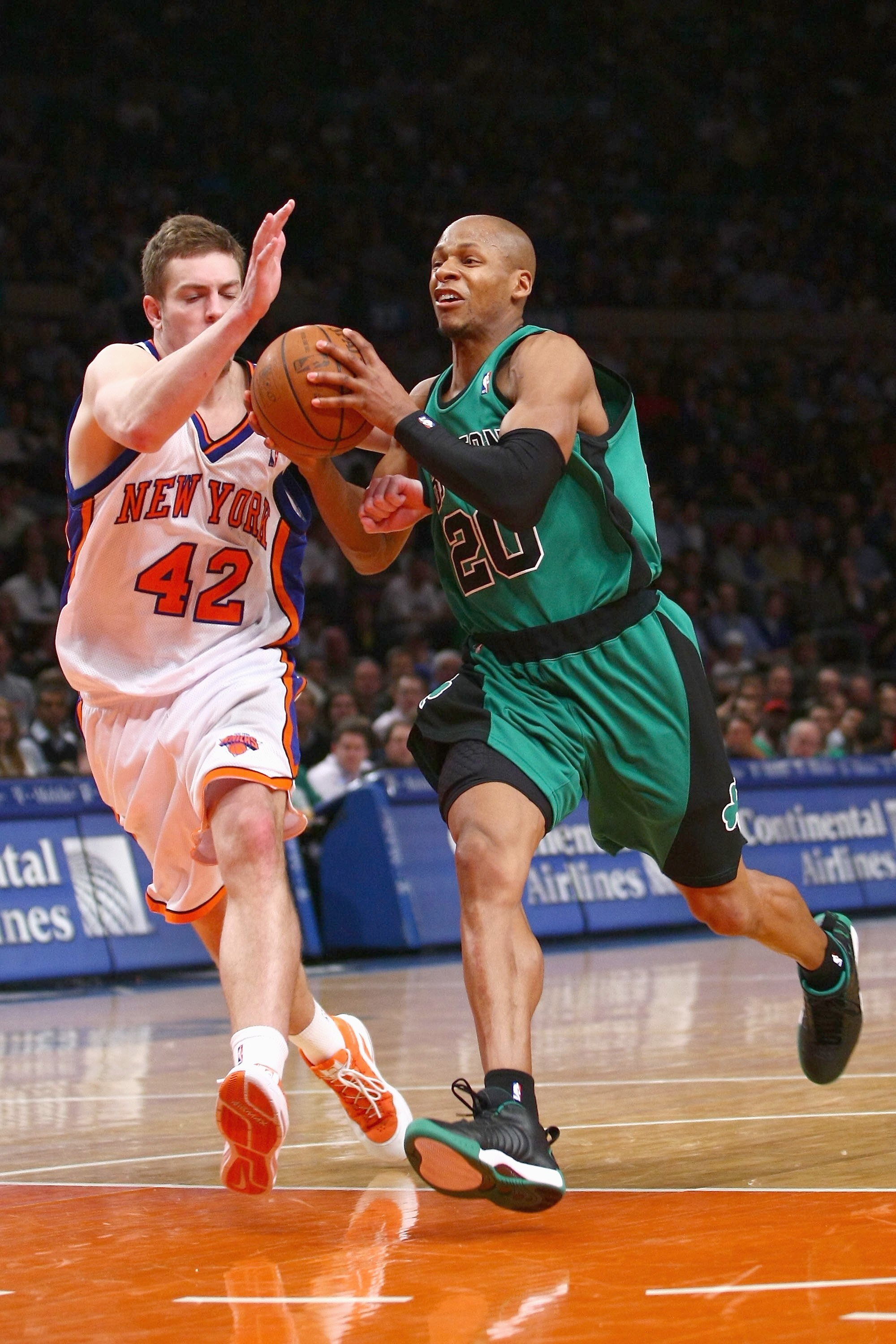 NEW YORK - FEBRUARY 06:  Ray Allen #20 of the Boston Celtics moves for the ball against David Lee #42 of the New York Knicks at Madison Square Garden on February 6, 2009 in New York City. NOTE TO USER: User expressly acknowledges and agrees that, by downl