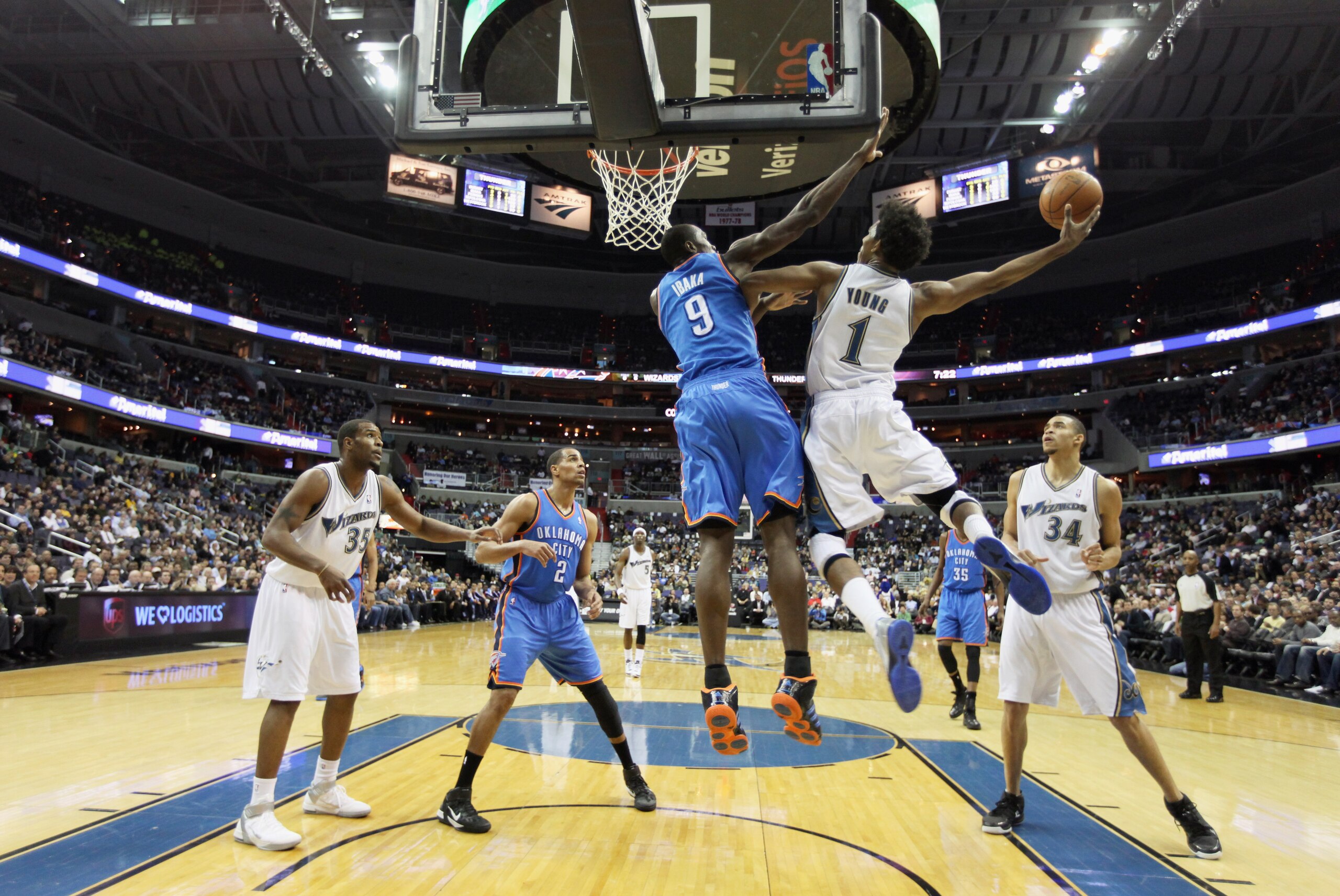 WASHINGTON, DC - MARCH 14: Serge Ibaka #9 of the Oklahoma City Thunder defends against Nick Young #1 of the Washington Wizards during the first half at the Verizon Center on March 14, 2011 in Washington, DC. NOTE TO USER: User expressly acknowledges and a
