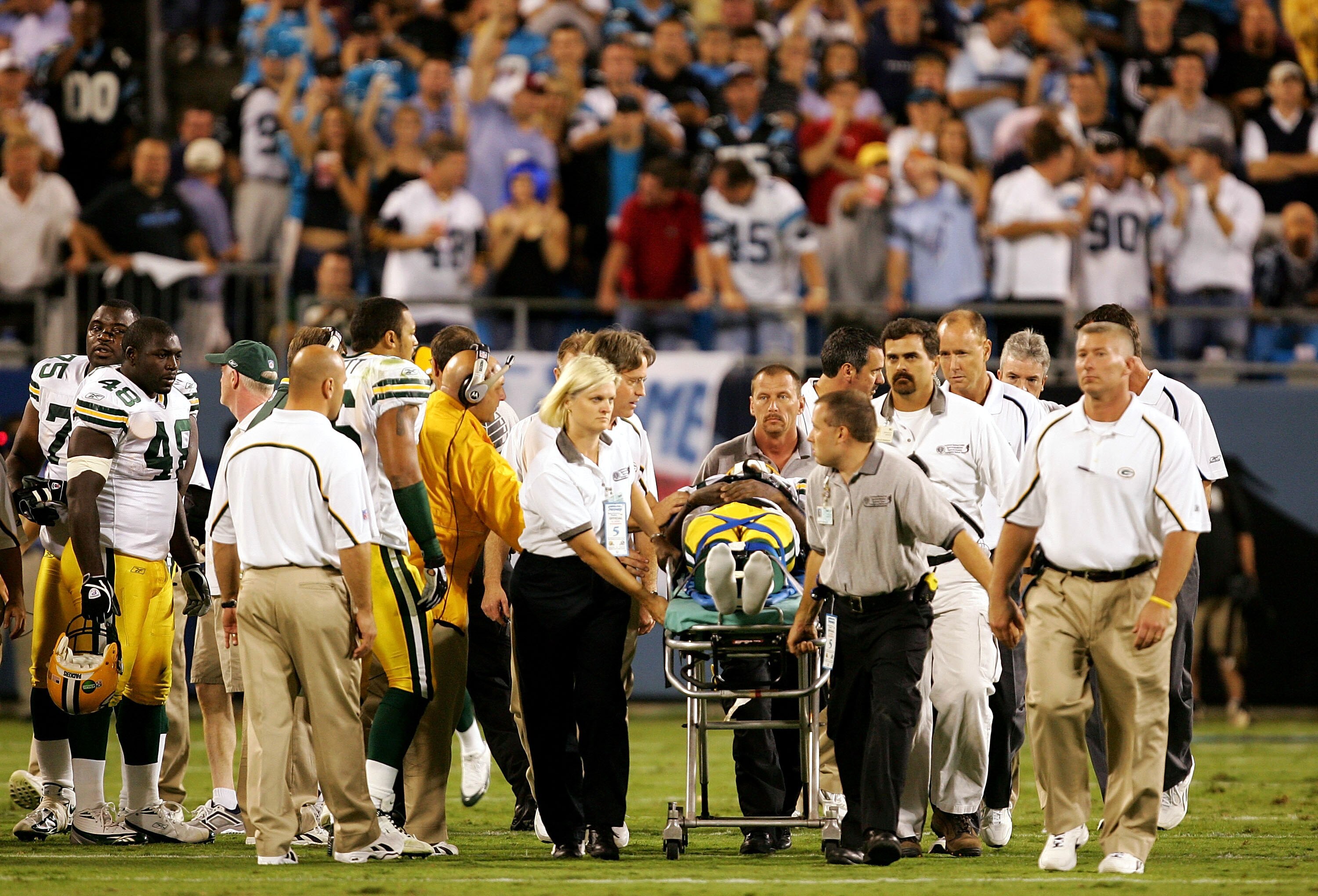 CHARLOTTE, NC - OCTOBER 03:  Terrence Murphy #85 of the Green Bay Packers is carried off the field during a game against the Carolina Panthers October 3, 2005 at Bank of America Stadium in Charlotte, North Carolina.  (Photo By Streeter Lecka/Getty Images)