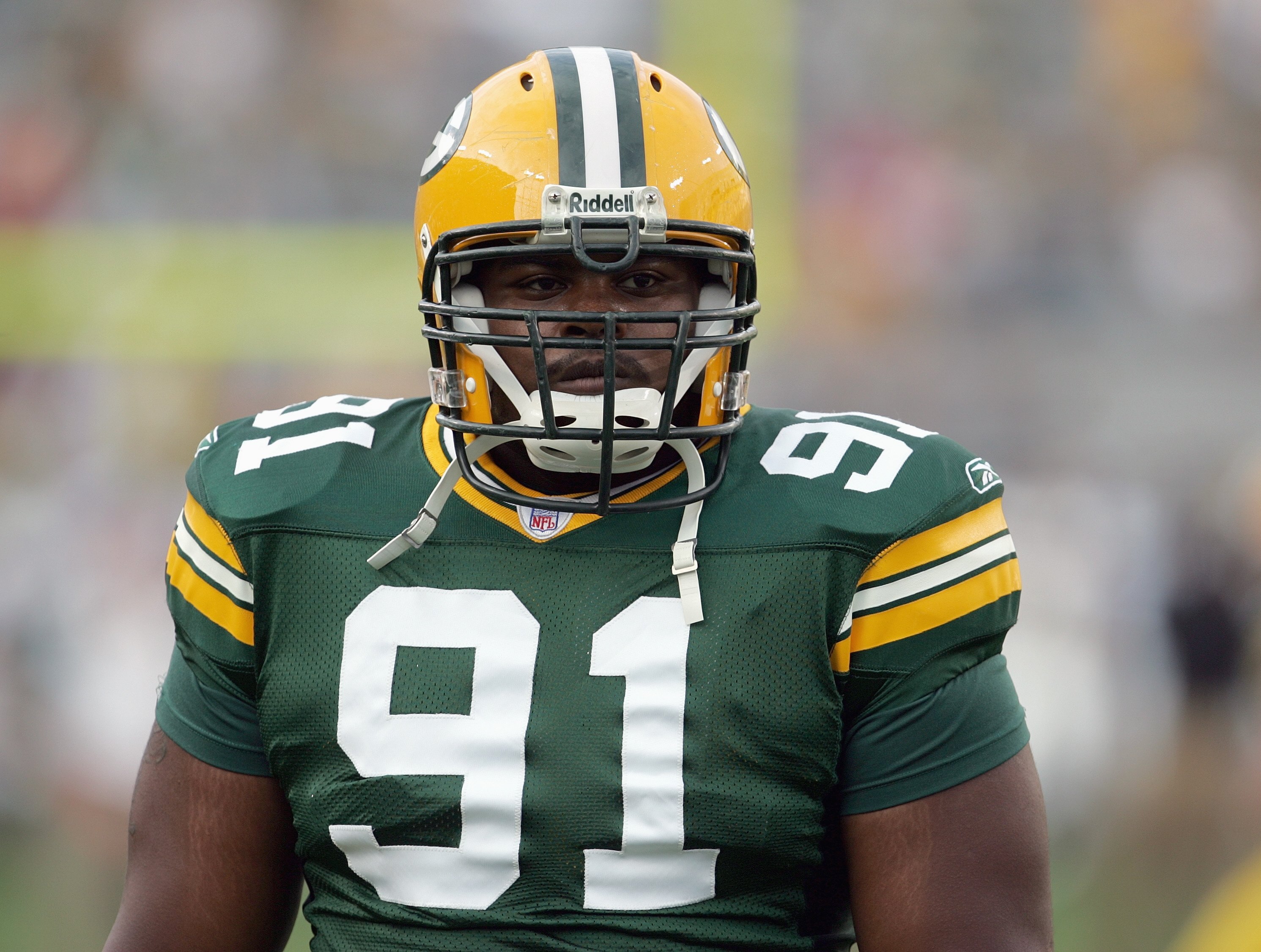 GREEN BAY, WI - AUGUST 23:  Justin Harrell #91 of the Green Bay Packers looks on the field during the game against the Jacksonville Jaguars on August 23, 2007 at Lambeau Field in Green Bay, Wisconsin. (Photo by Jonathan Daniel/Getty Images)