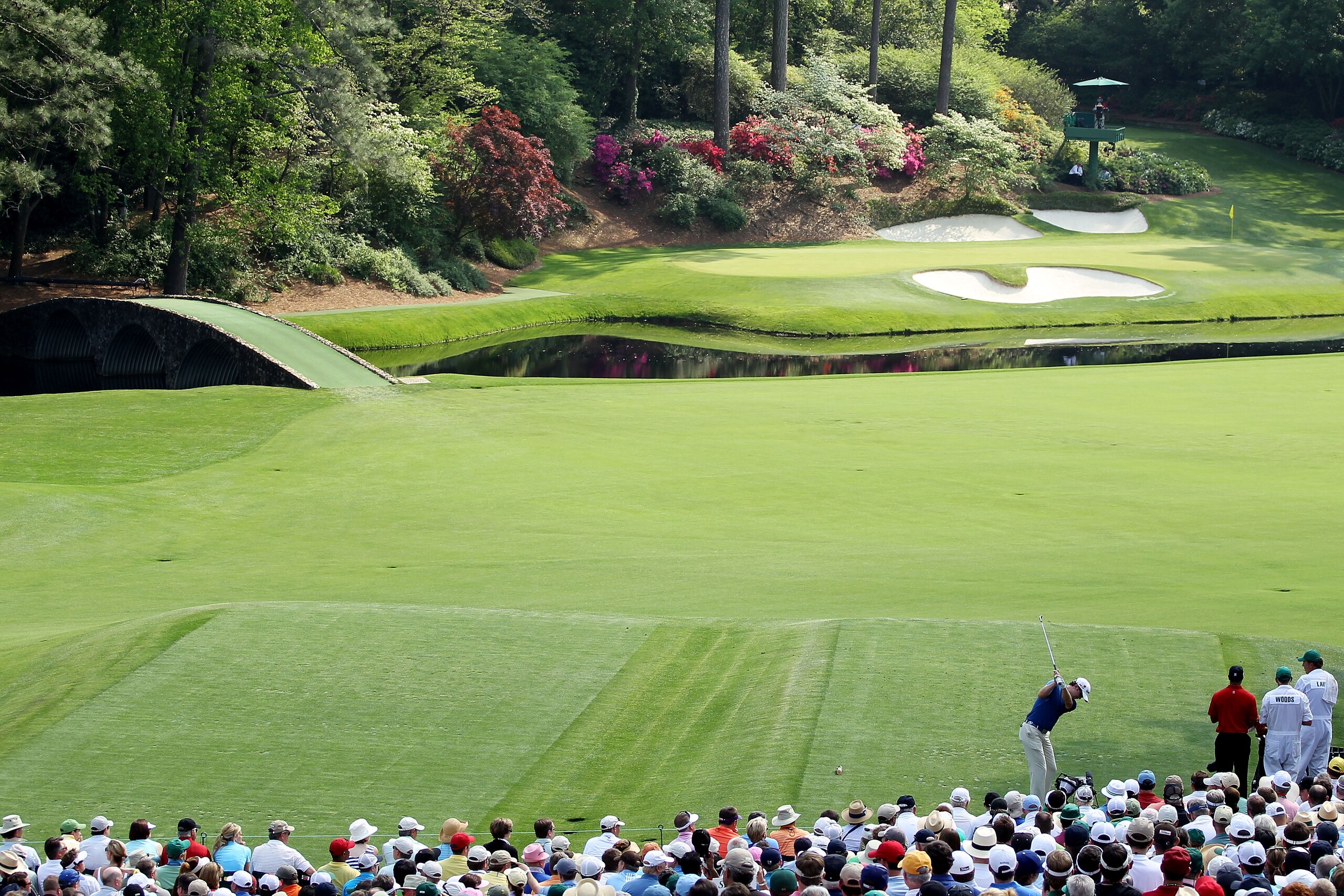 AUGUSTA, GA - APRIL 10: Martin Laird of Scotland hits his tee shot on the 12th hole as Tiger Woods looks on during the final round of the 2011 Masters Tournament at Augusta National Golf Club on April 10, 2011 in Augusta, Georgia. (Photo by Jamie Squire AUGUSTA, GA - APRIL 10: Martin Laird of Scotland hits his tee shot on the 12th hole as Tiger Woods looks on during the final round of the 2011 Masters Tournament at Augusta National Golf Club on April 10, 2011 in Augusta, Georgia. (Photo by Jamie Squire