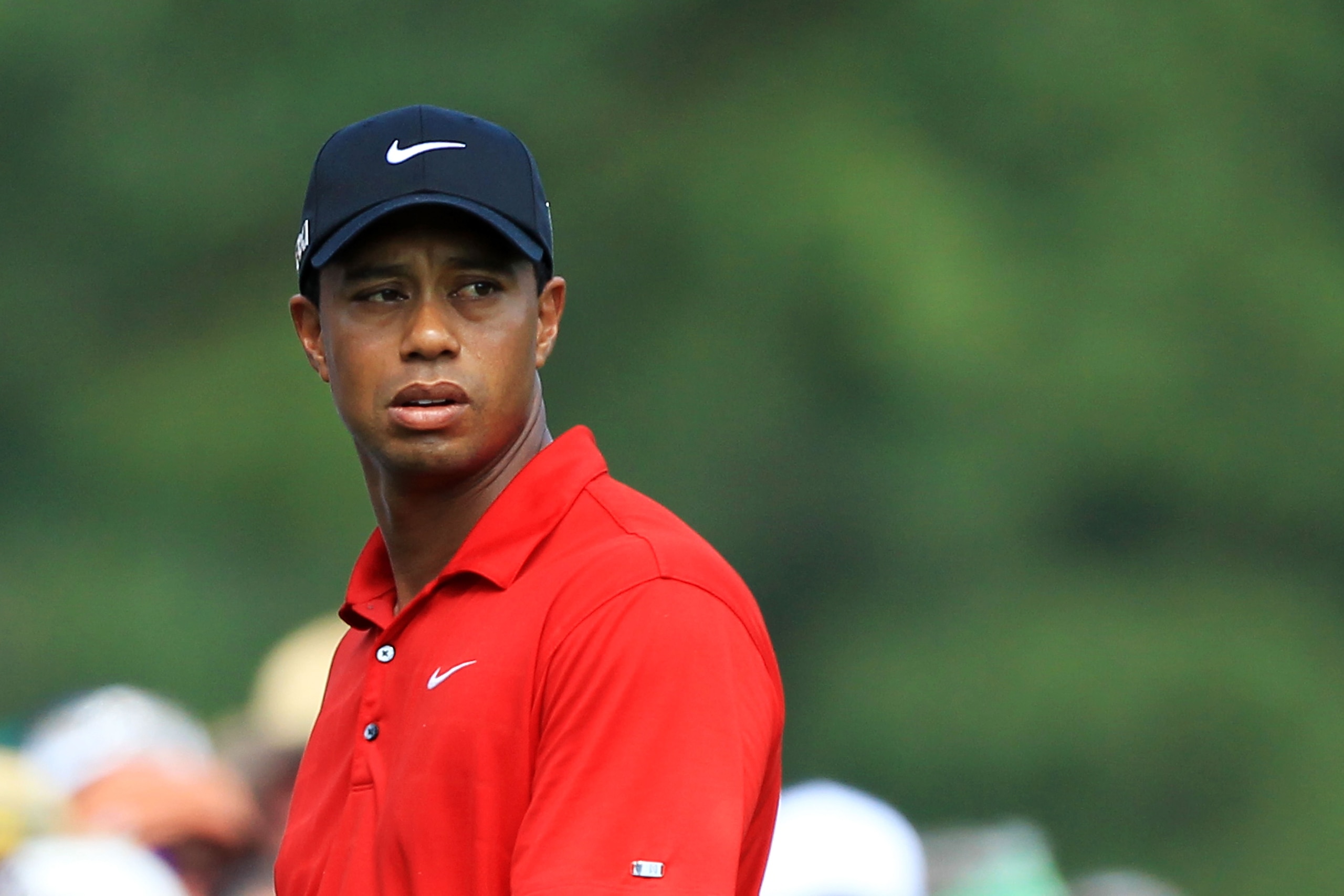 AUGUSTA, GA - APRIL 10: Tiger Woods looks on during the final round of the 2011 Masters Tournament on April 10, 2011 in Augusta, Georgia. (Photo by David Cannon/Getty Images) AUGUSTA, GA - APRIL 10: Tiger Woods looks on during the final round of the 2011 Masters Tournament on April 10, 2011 in Augusta, Georgia. (Photo by David Cannon/Getty Images)