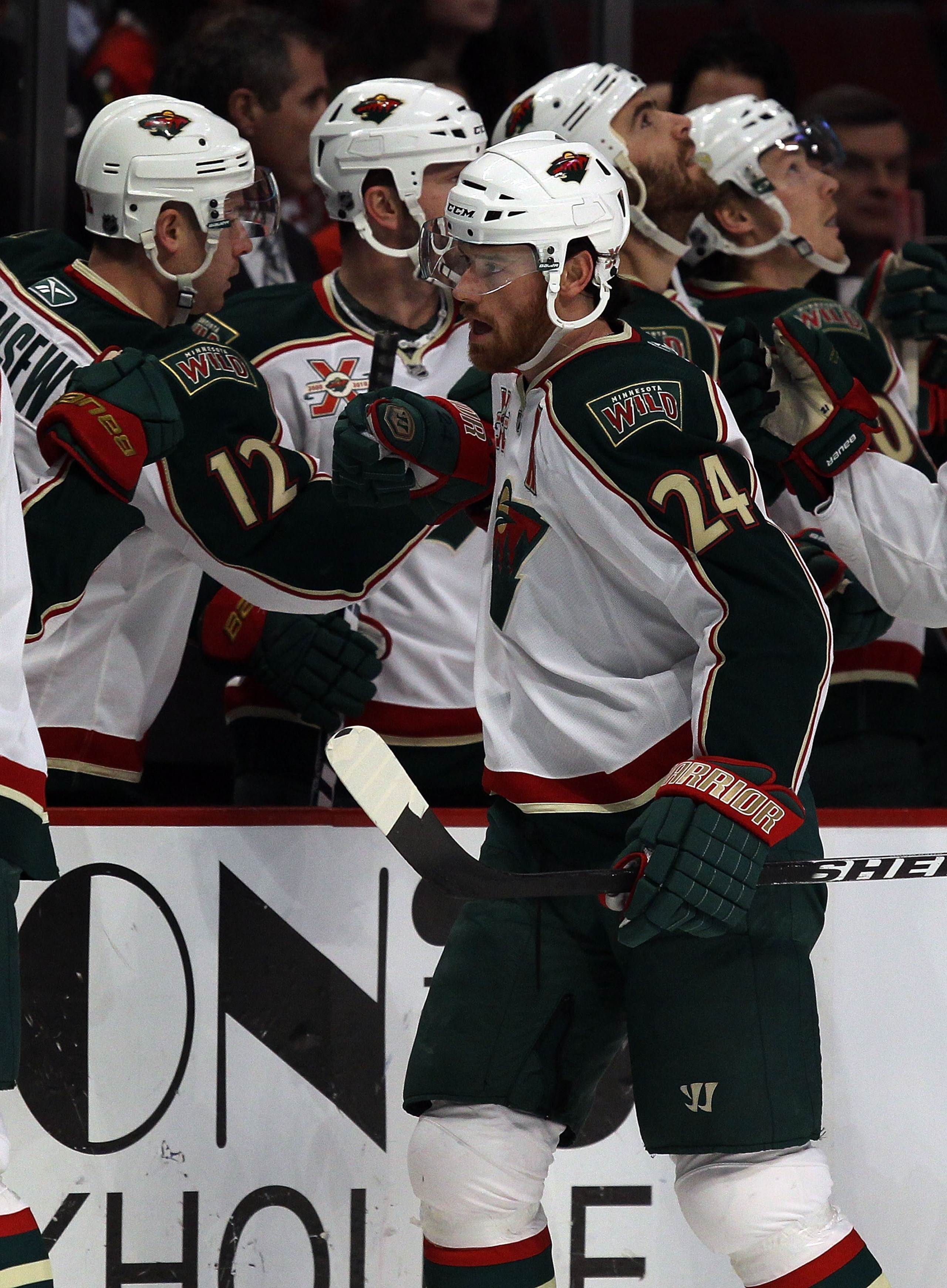 CHICAGO, IL - JANUARY 25: Martin Havlat #24 of the Minnesota Wild is congratulated by teammates after scoring a 1st period goal against the Chicago Blackhawks at the United Center on January 25, 2011 in Chicago, Illinois. The Wild defeated the Blackhawks 