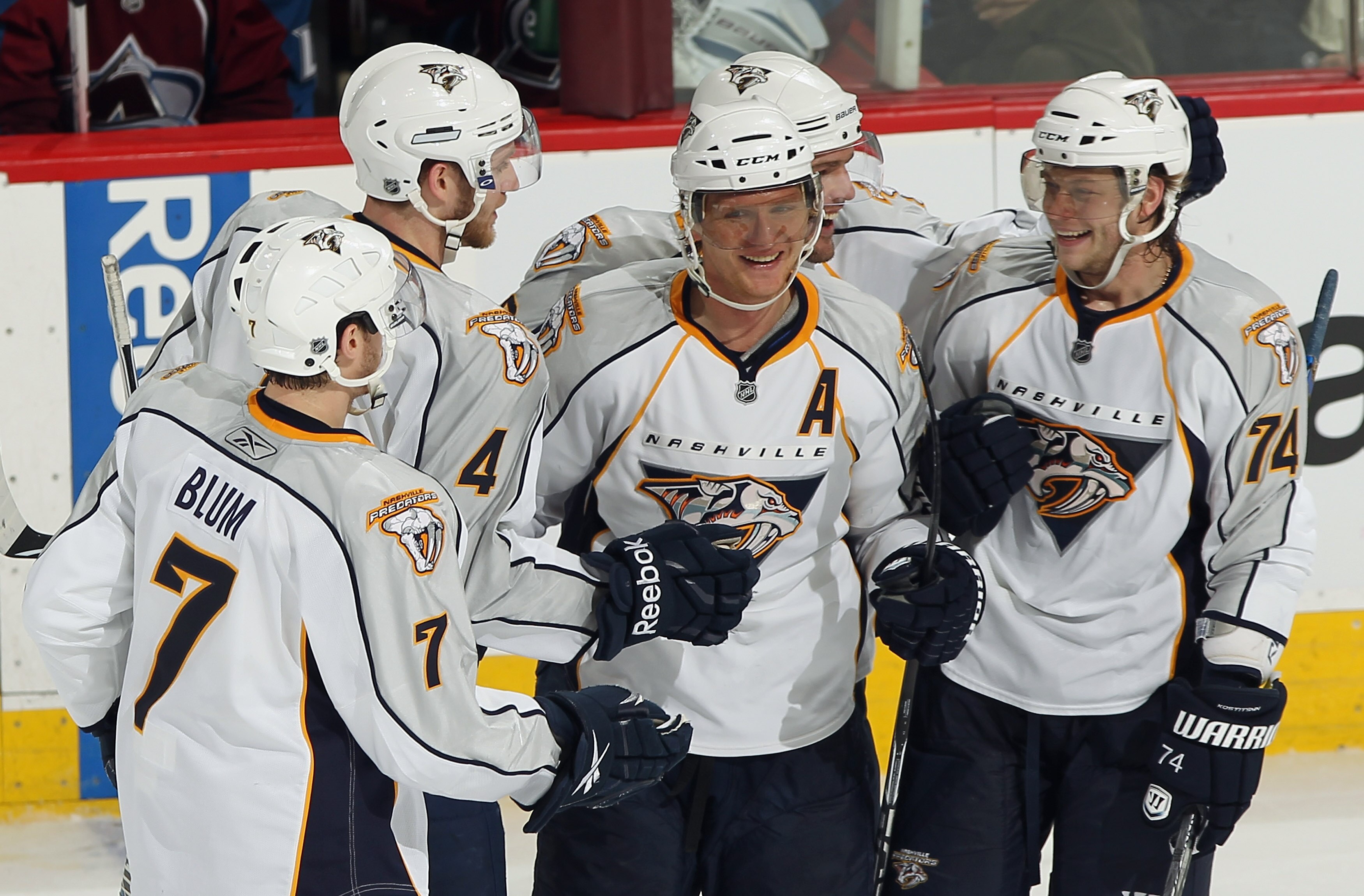 DENVER, CO - MARCH 31:  (L-R) Jonathon Blum #7, Cody Franson #4, Martin Erat #10, Mike Fisher #12 and Sergei Kostitsyn #74 of the Nashville Predators celebrate Martin Erat's third period goal against the Colorado Avalanche at the Pepsi Center on March 31,