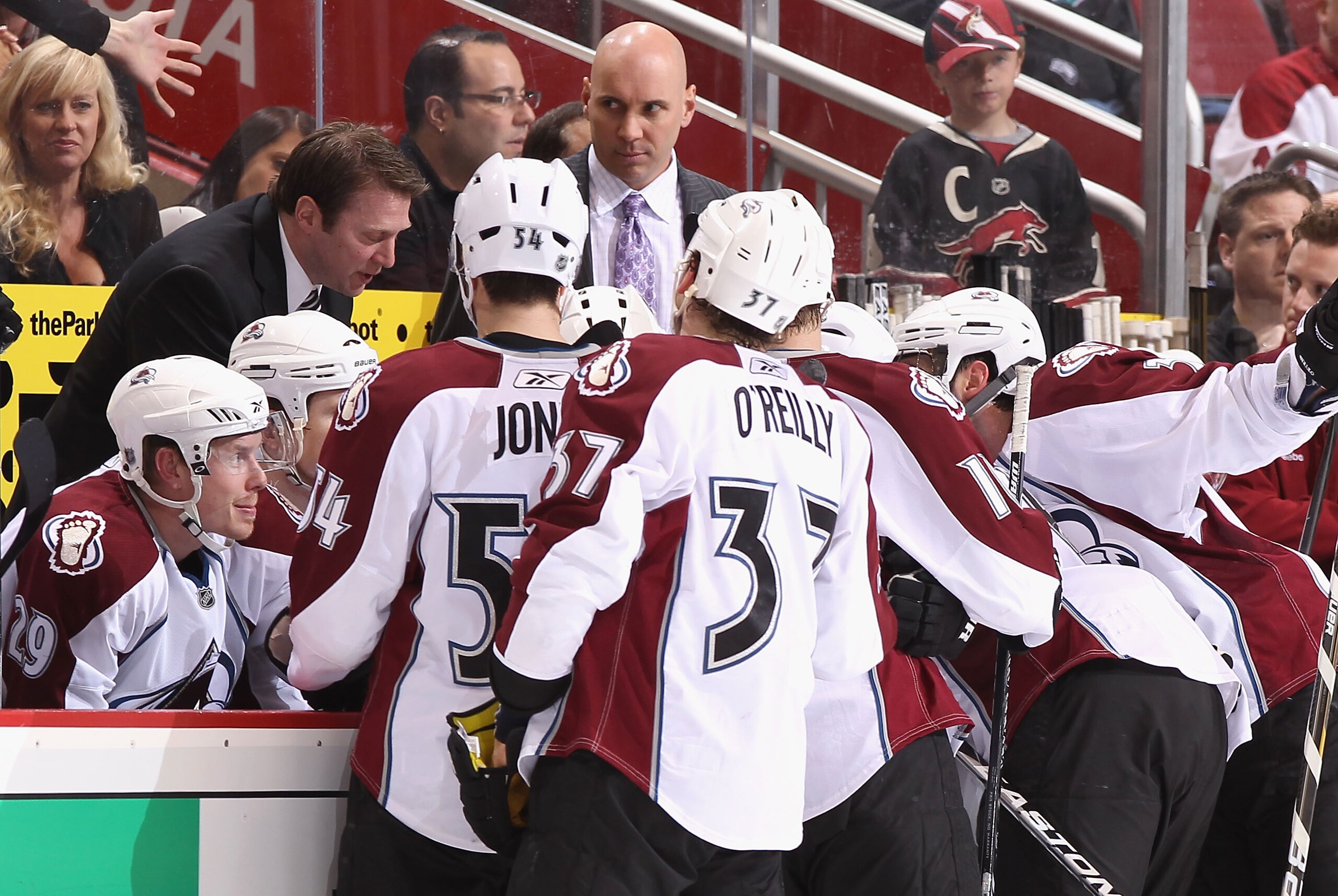 GLENDALE, AZ - APRIL 01:  The Colorado Avalanche listen to head coach Joe Sacco during a time out in the NHL game against the Phoenix Coyotes at Jobing.com Arena on April 1, 2011 in Glendale, Arizona. The Avalanche defeated the Coyotes 4-3 in an overtime 