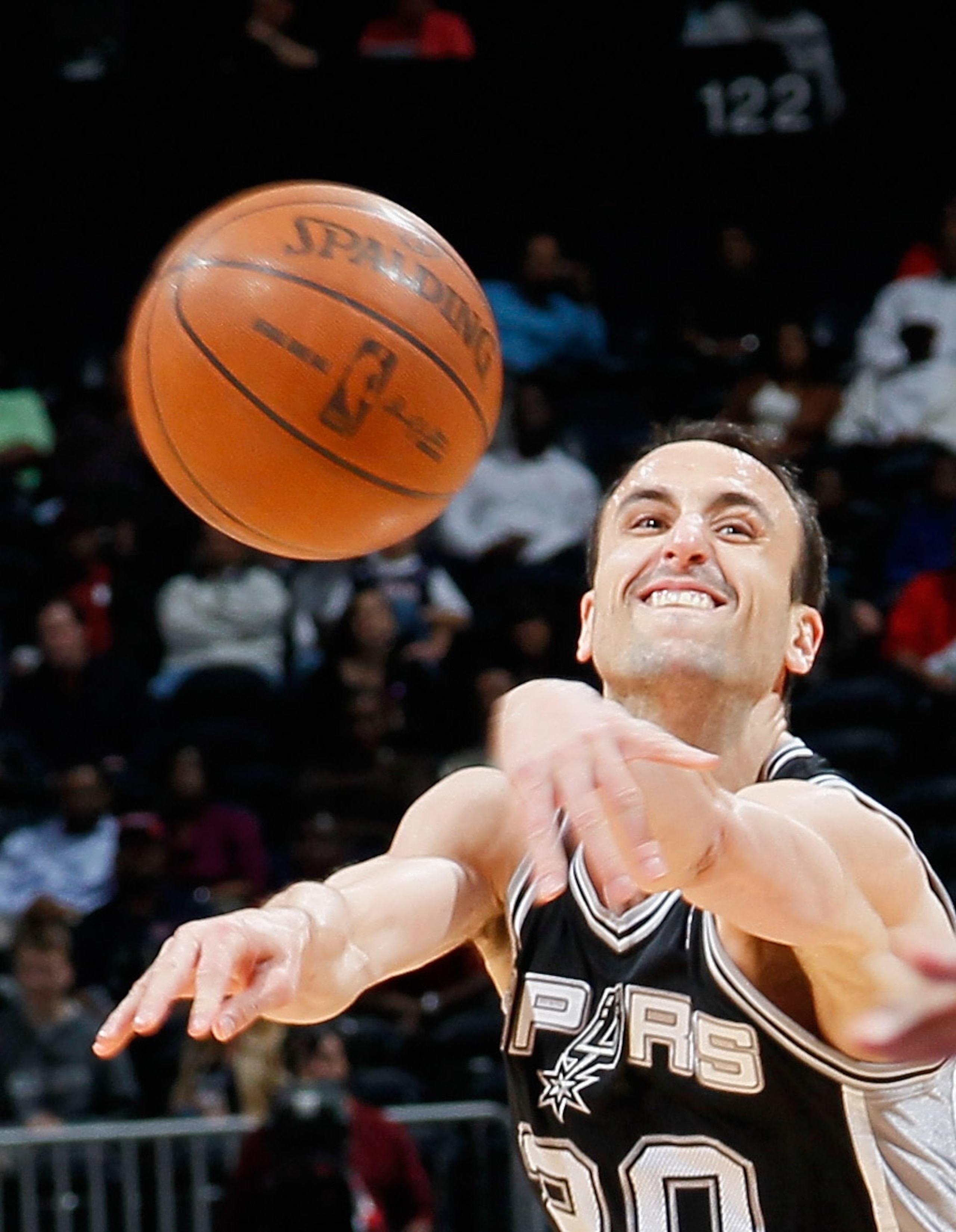 ATLANTA, GA - APRIL 05:  Manu Ginobili #20 of the San Antonio Spurs against the Atlanta Hawks at Philips Arena on April 5, 2011 in Atlanta, Georgia.  NOTE TO USER: User expressly acknowledges and agrees that, by downloading and/or using this Photograph, u
