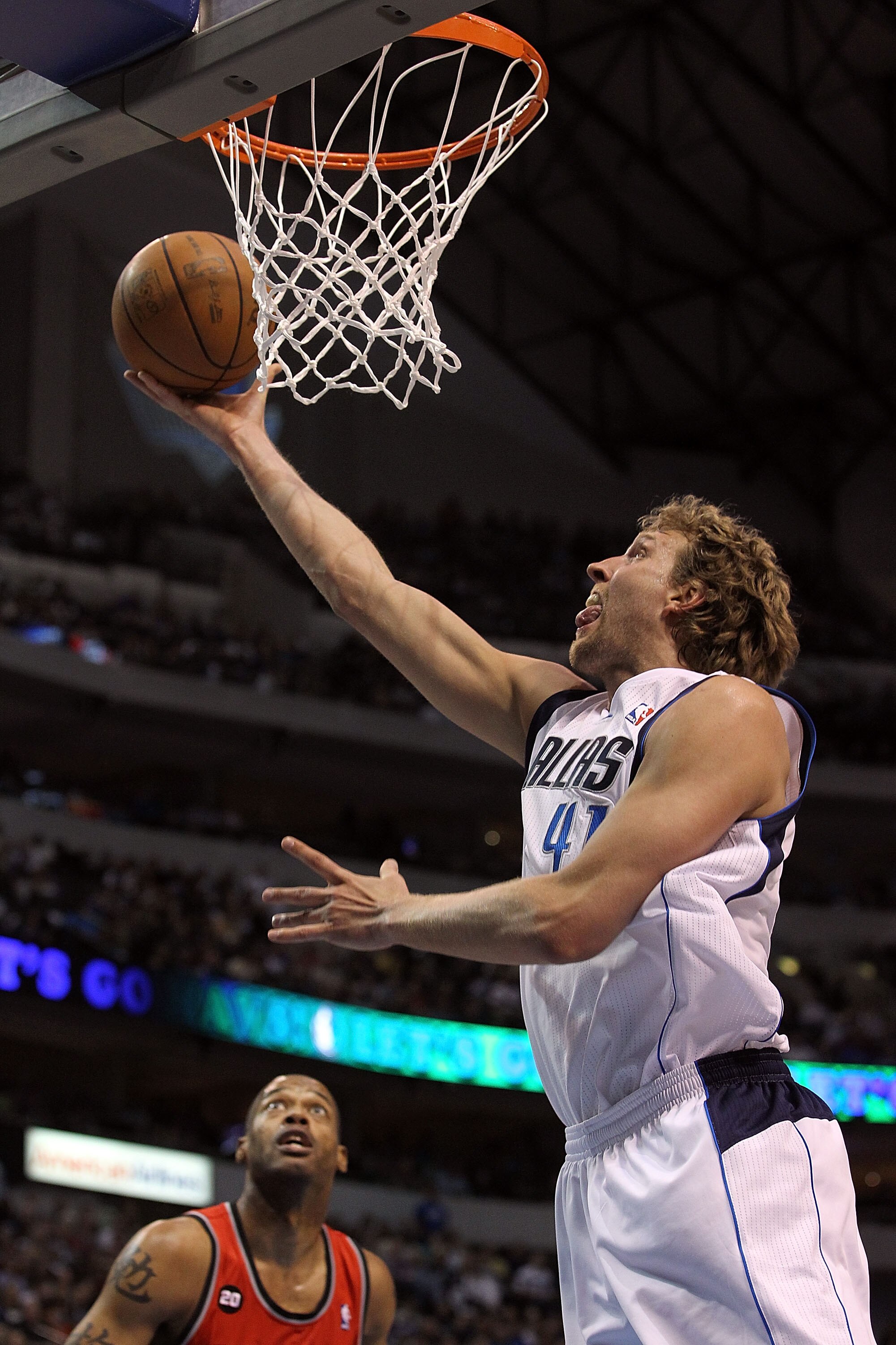 DALLAS, TX - APRIL 16:  Forward Dirk Nowitzki #41 of the Dallas Mavericks takes a shot against the Portland Trail Blazers in Game One of the Western Conference Quarterfinals during the 2011 NBA Playoffs on April 16, 2011 at American Airlines Center in Dal